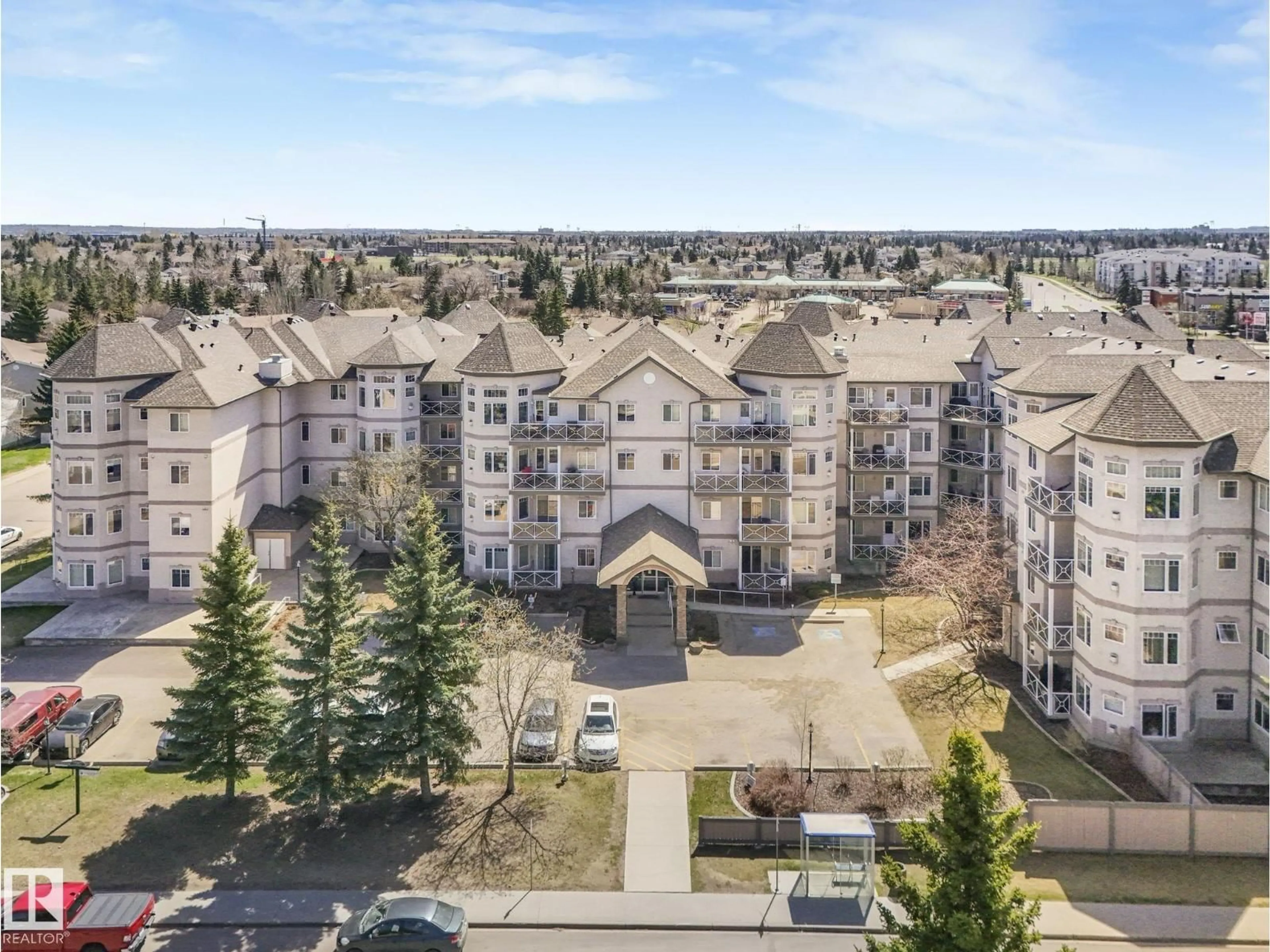 A pic from outside/outdoor area/front of a property/back of a property/a pic from drone, mountain view for #317 - 2420 108 ST, Edmonton Alberta T6J7J3