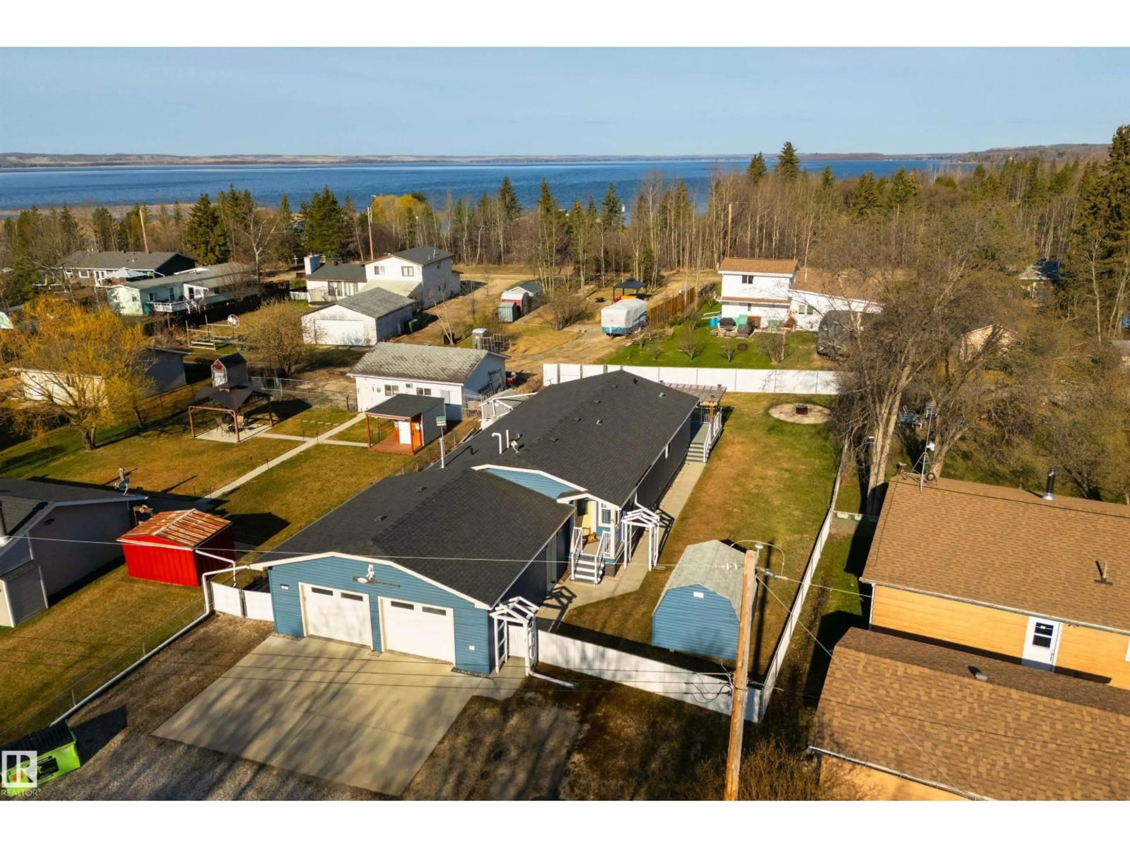 A pic from outside/outdoor area/front of a property/back of a property/a pic from drone, water/lake/river/ocean view for 53113 - 41 RGE ROAD 44, Rural Parkland County Alberta T0E2K0
