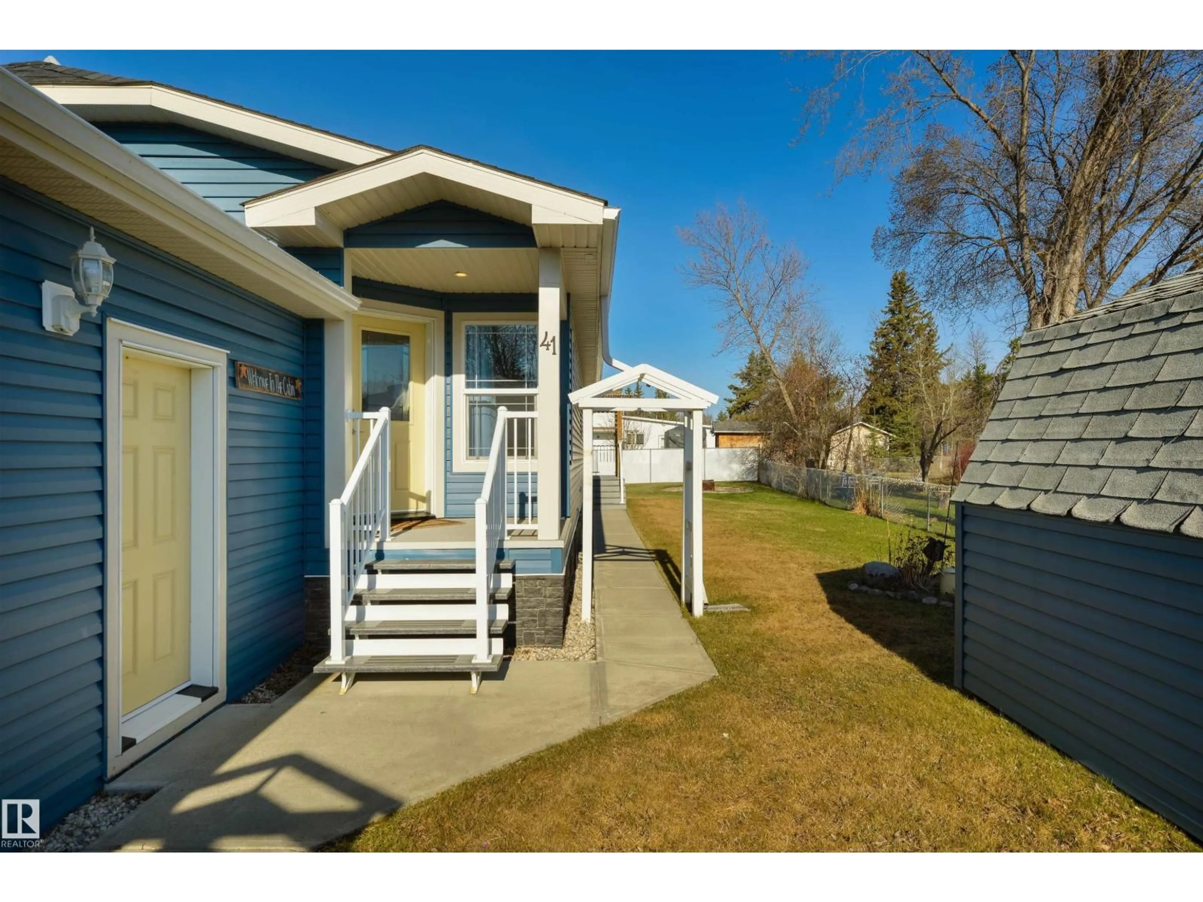 Home with vinyl exterior material, street for 53113 - 41 RGE ROAD 44, Rural Parkland County Alberta T0E2K0