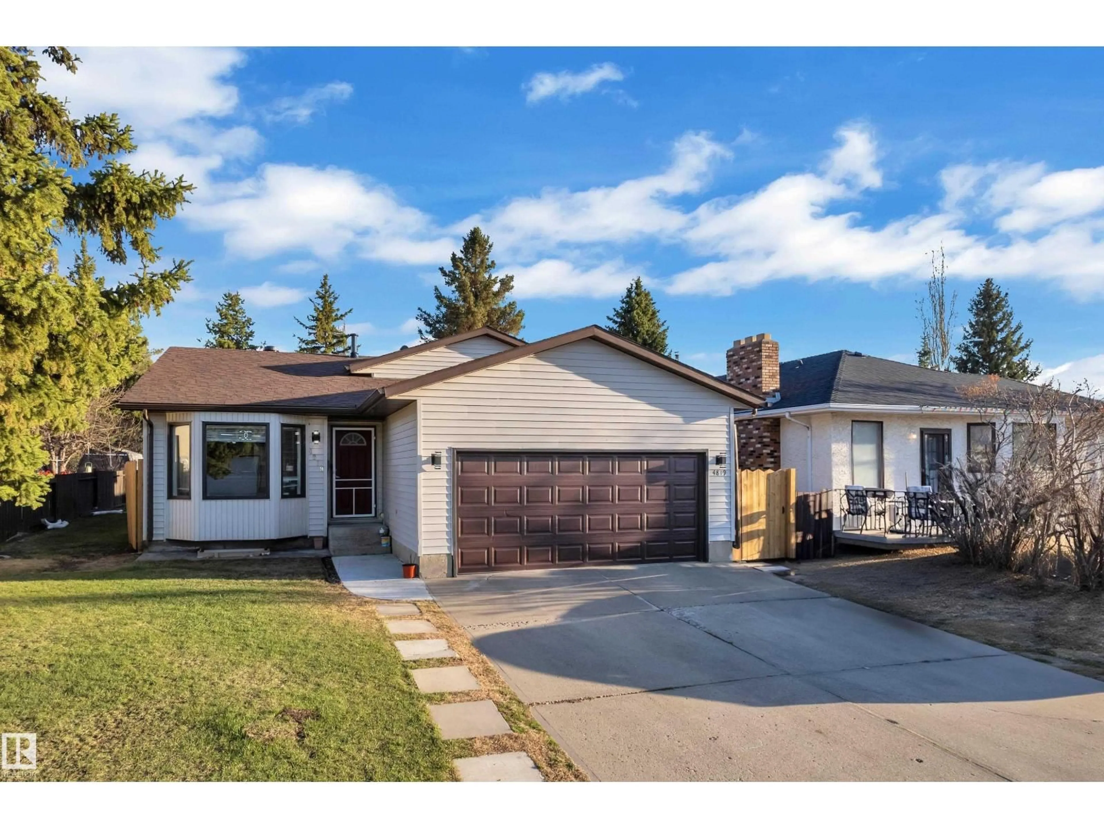 Home with vinyl exterior material, street for 4819 30 AV, Edmonton Alberta T6L4R4