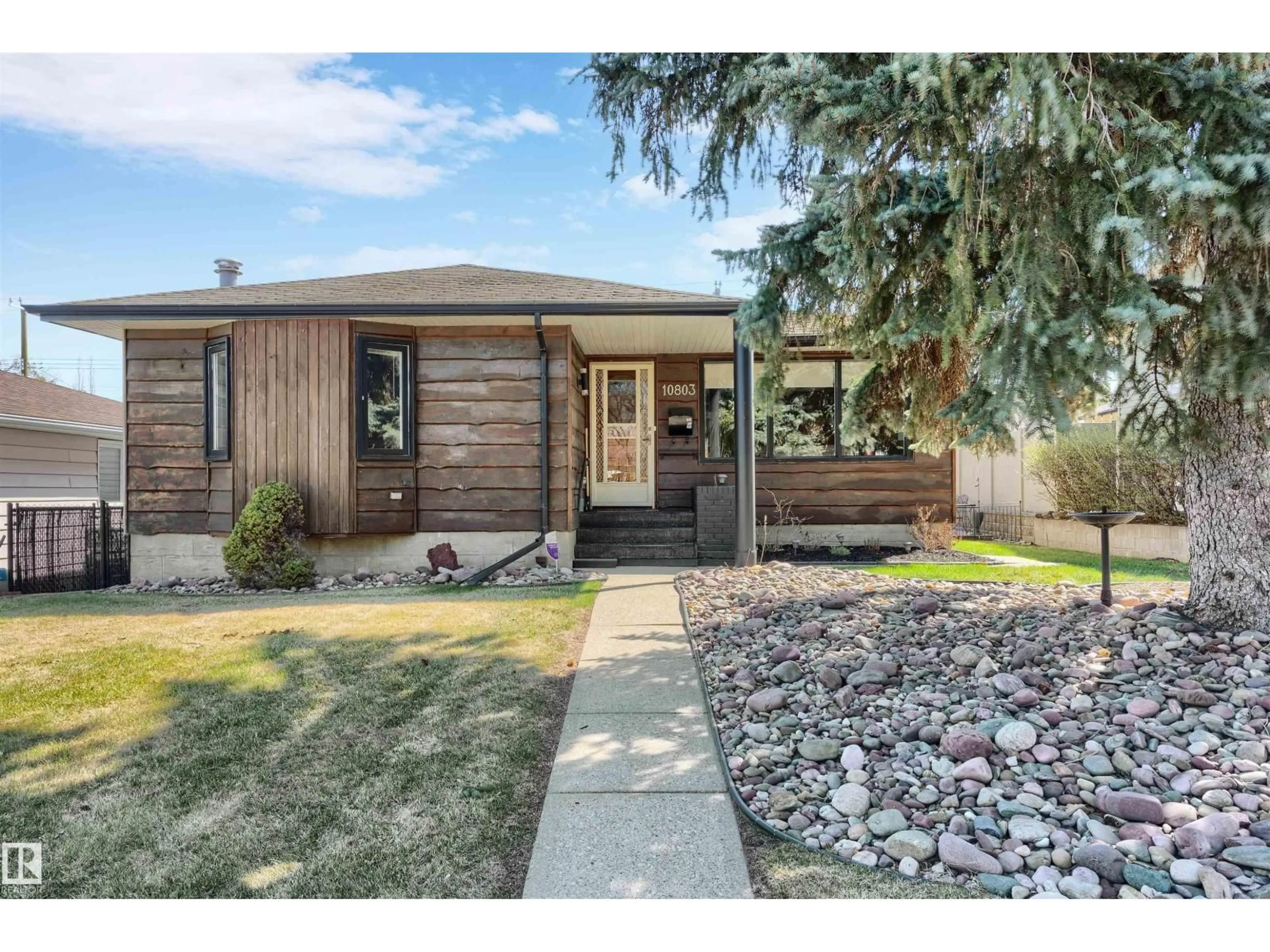 Home with brick exterior material, street for NW - 10803 52 ST, Edmonton Alberta T6A2H4