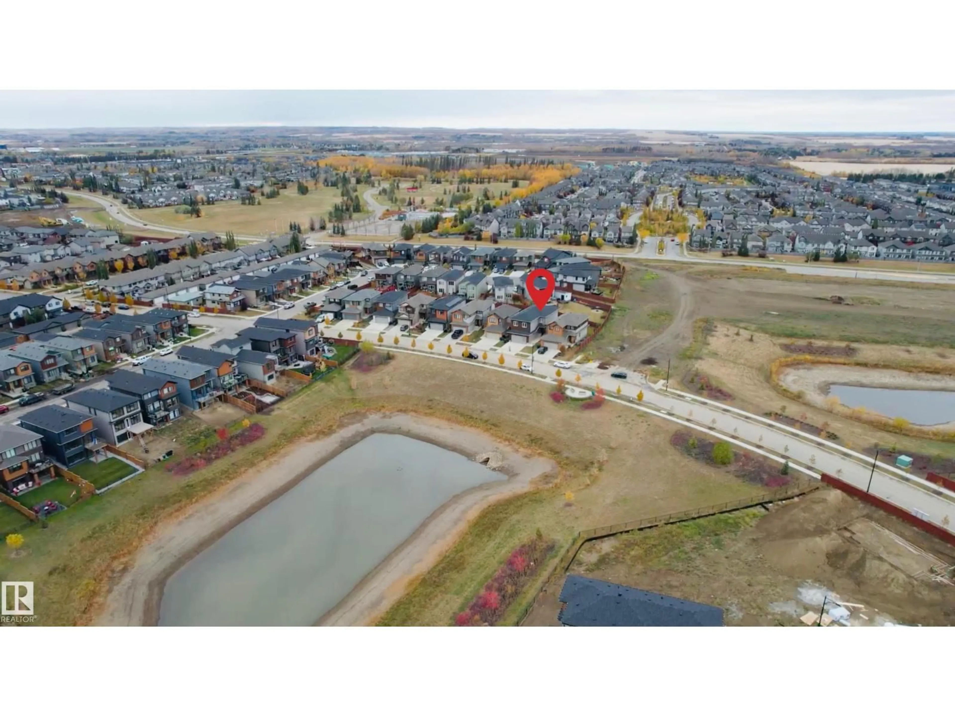 A pic from outside/outdoor area/front of a property/back of a property/a pic from drone, water/lake/river/ocean view for 22 TIMBRE WY, Spruce Grove Alberta T7X0A7