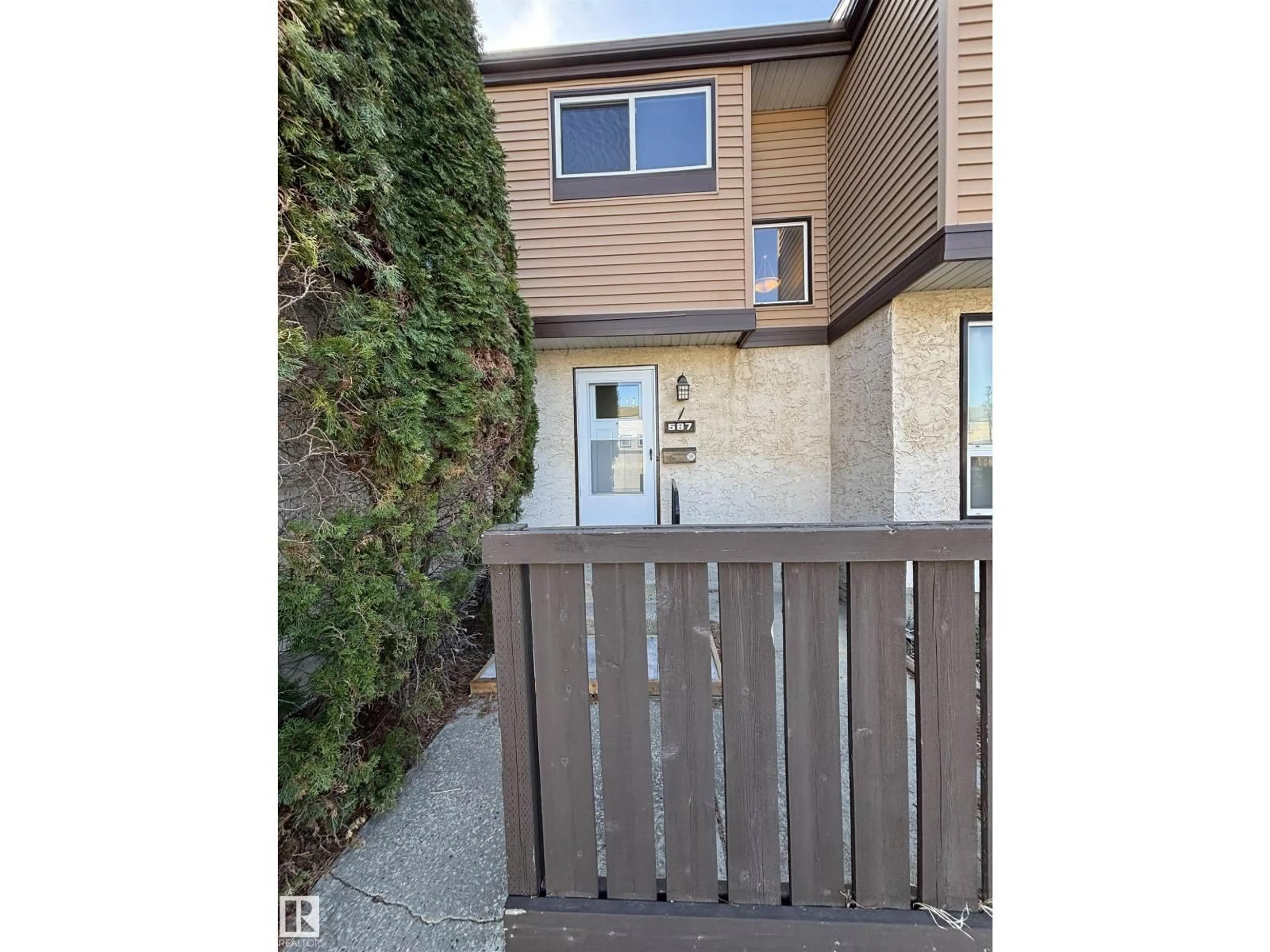 A pic from outside/outdoor area/front of a property/back of a property/a pic from drone, street for 587 KNOTTWOOD RD W NW, Edmonton Alberta T6K2V6