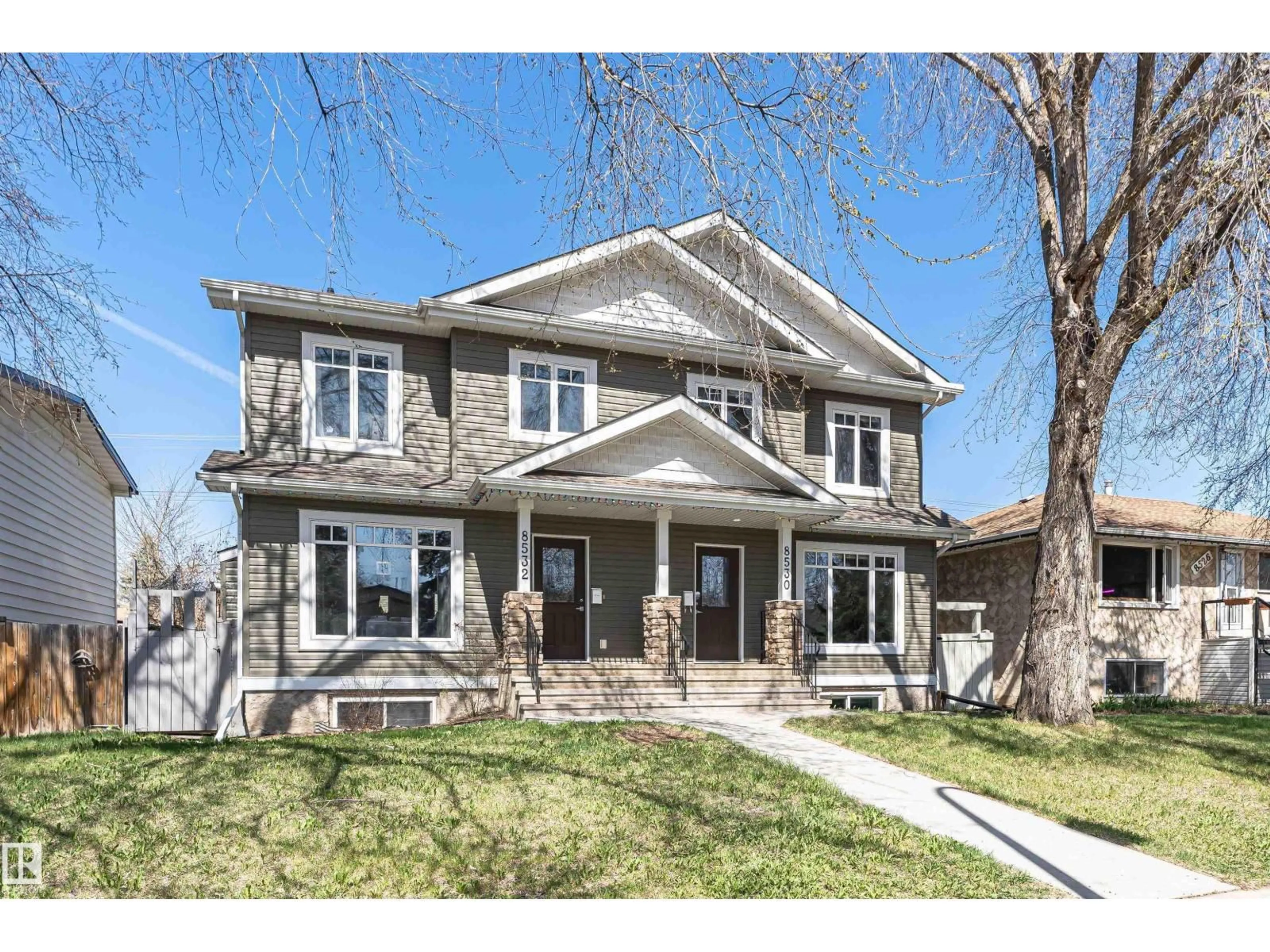 Home with brick exterior material, street for 8530 76 AV, Edmonton Alberta T6J0J3