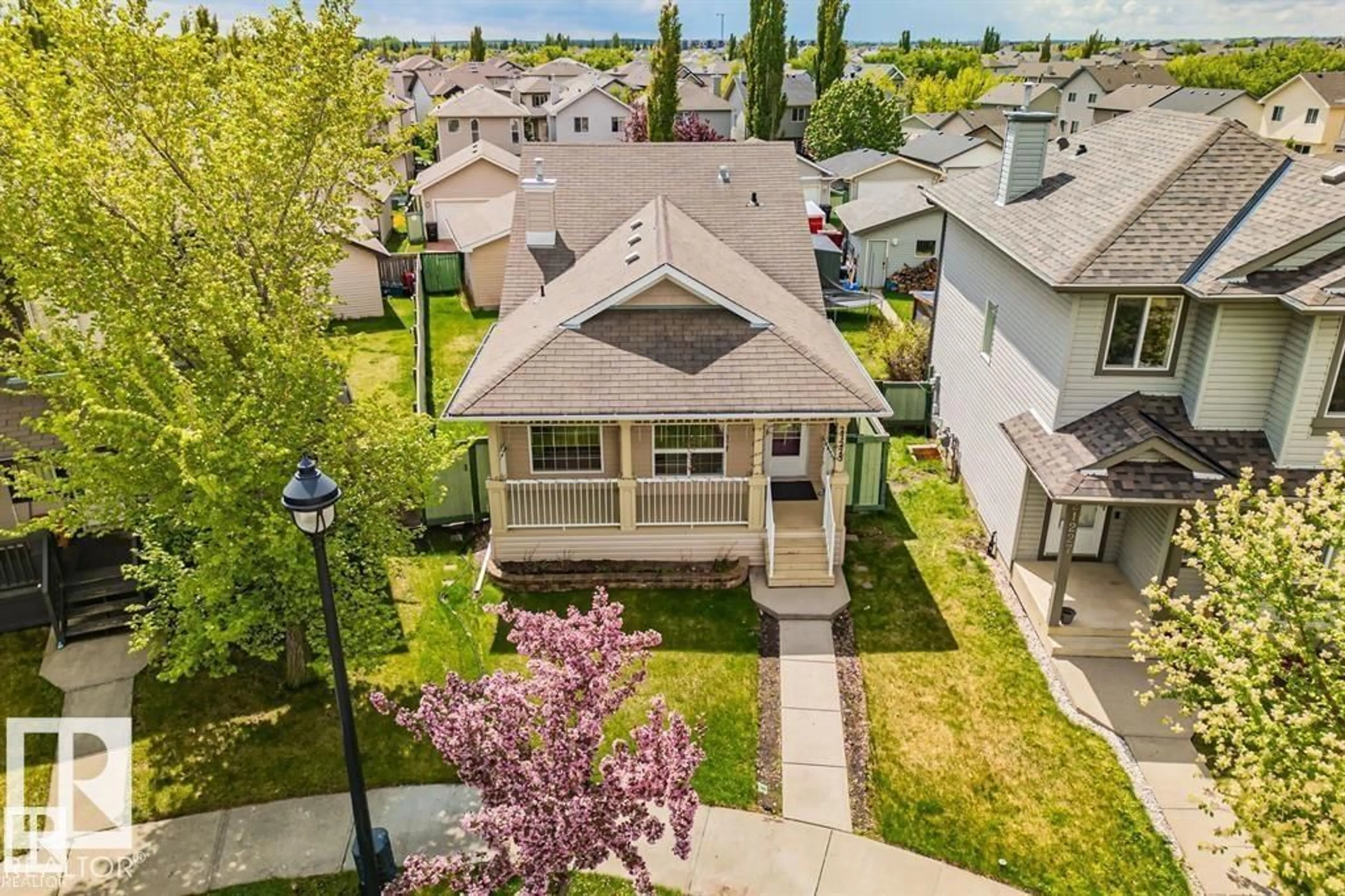A pic from outside/outdoor area/front of a property/back of a property/a pic from drone, street for 21223 92 AV, Edmonton Alberta T5T0W6