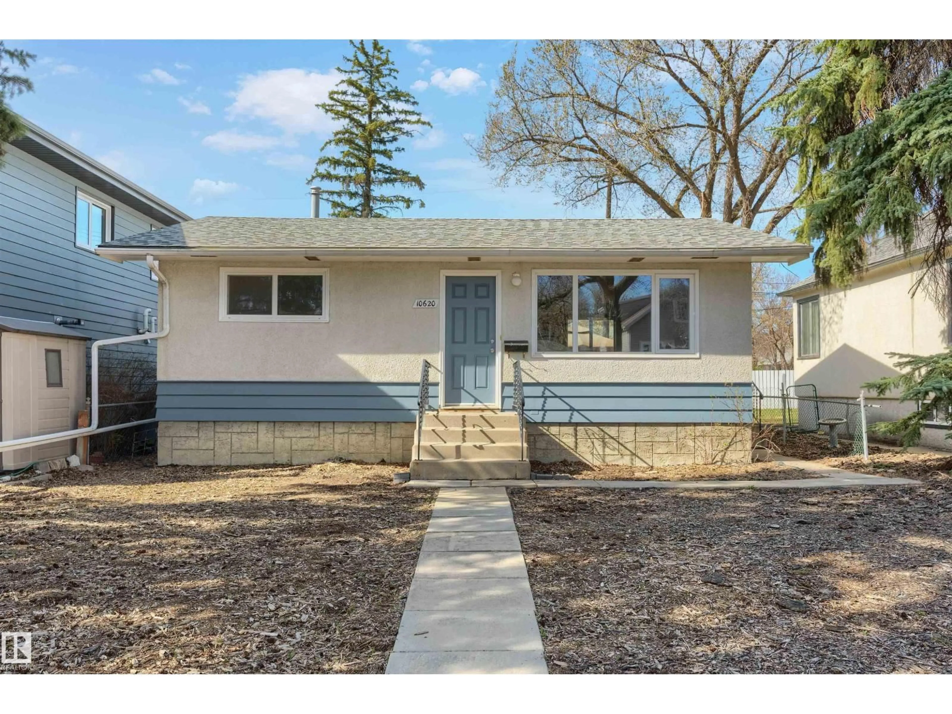 Home with vinyl exterior material, street for 10620 68 AV, Edmonton Alberta T6H2B4