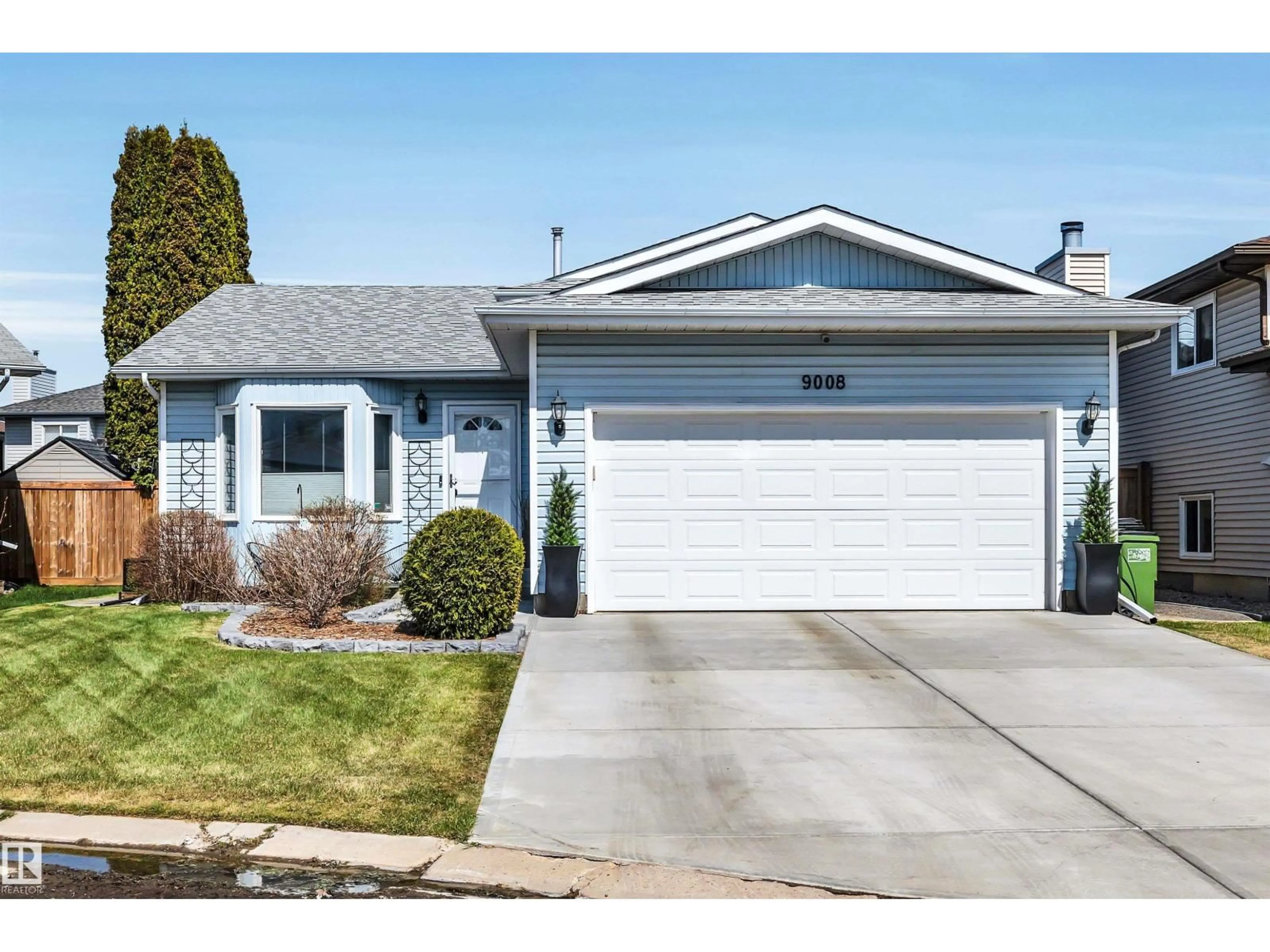 Home with vinyl exterior material, street for NW - 9008 169A AV, Edmonton Alberta T5Z2X5