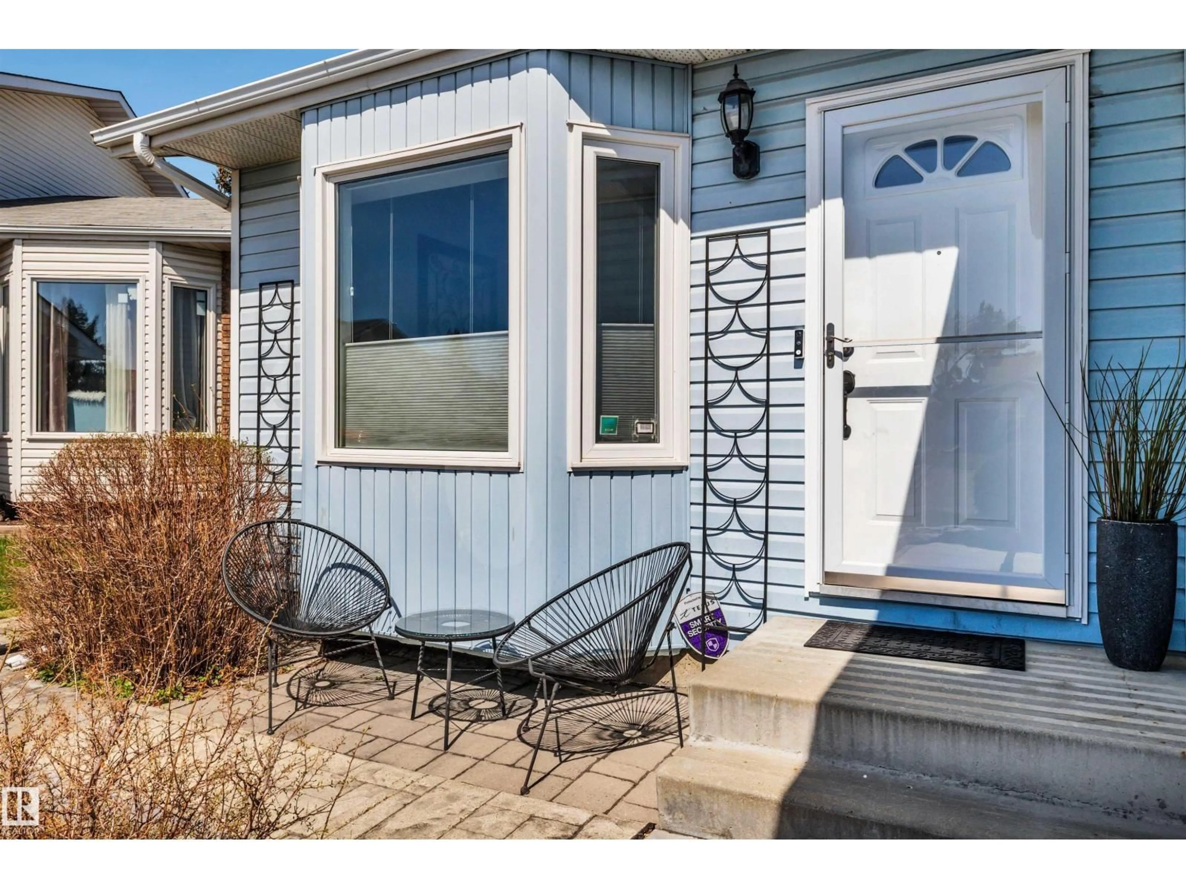 Home with vinyl exterior material, street for NW - 9008 169A AV, Edmonton Alberta T5Z2X5