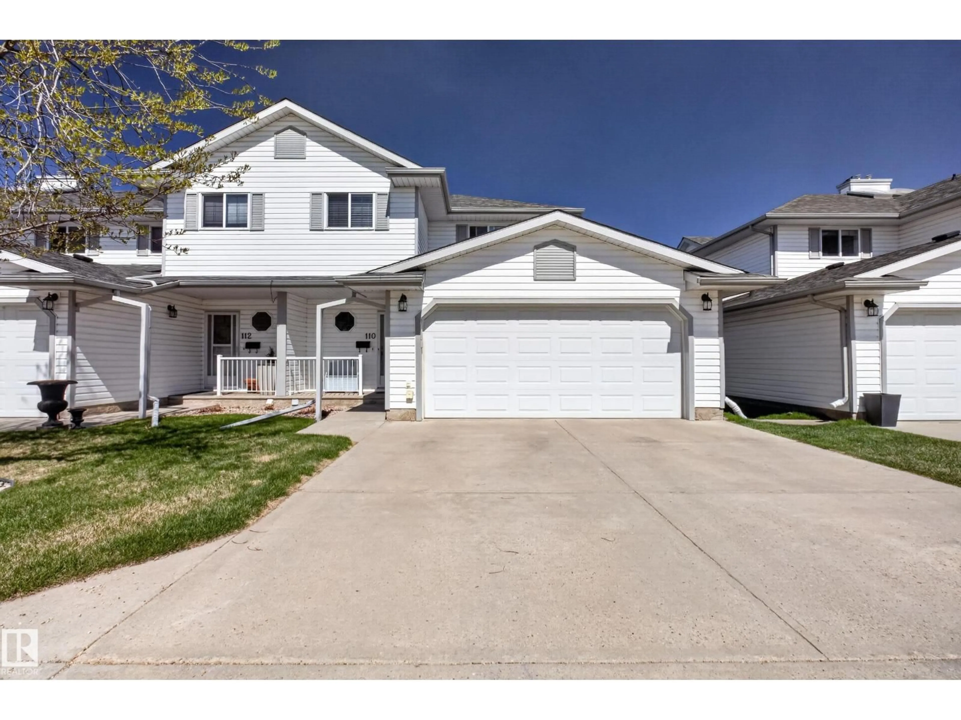 Home with vinyl exterior material, street for #110 - 4302 48 ST, Leduc Alberta T9E8J6