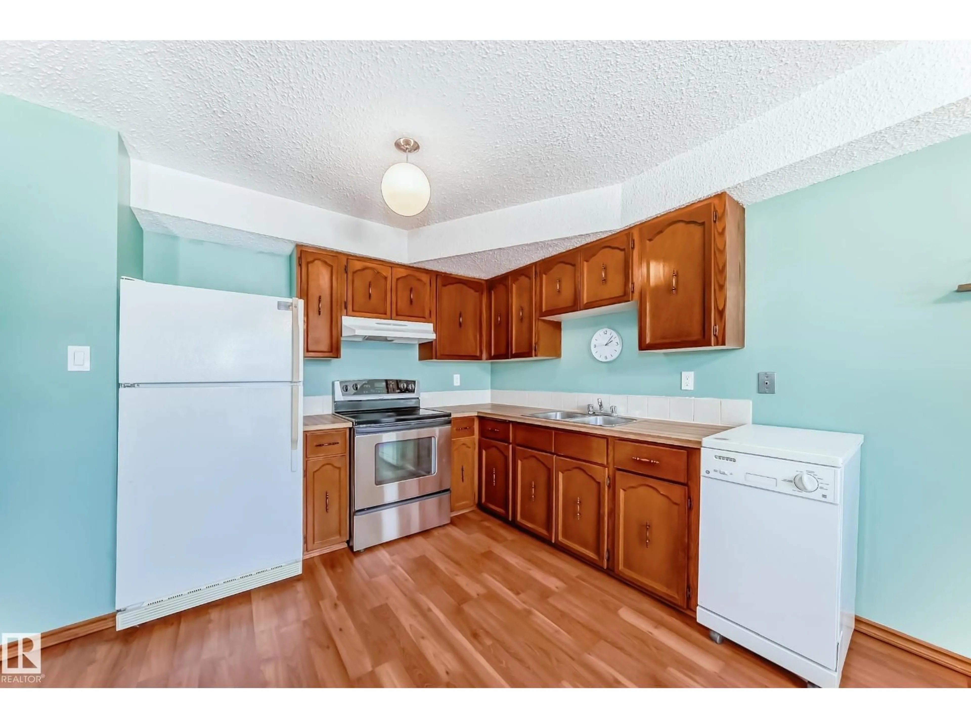 Standard kitchen, wood/laminate floor for NW - 13862 24 ST, Edmonton Alberta T5Y1B6