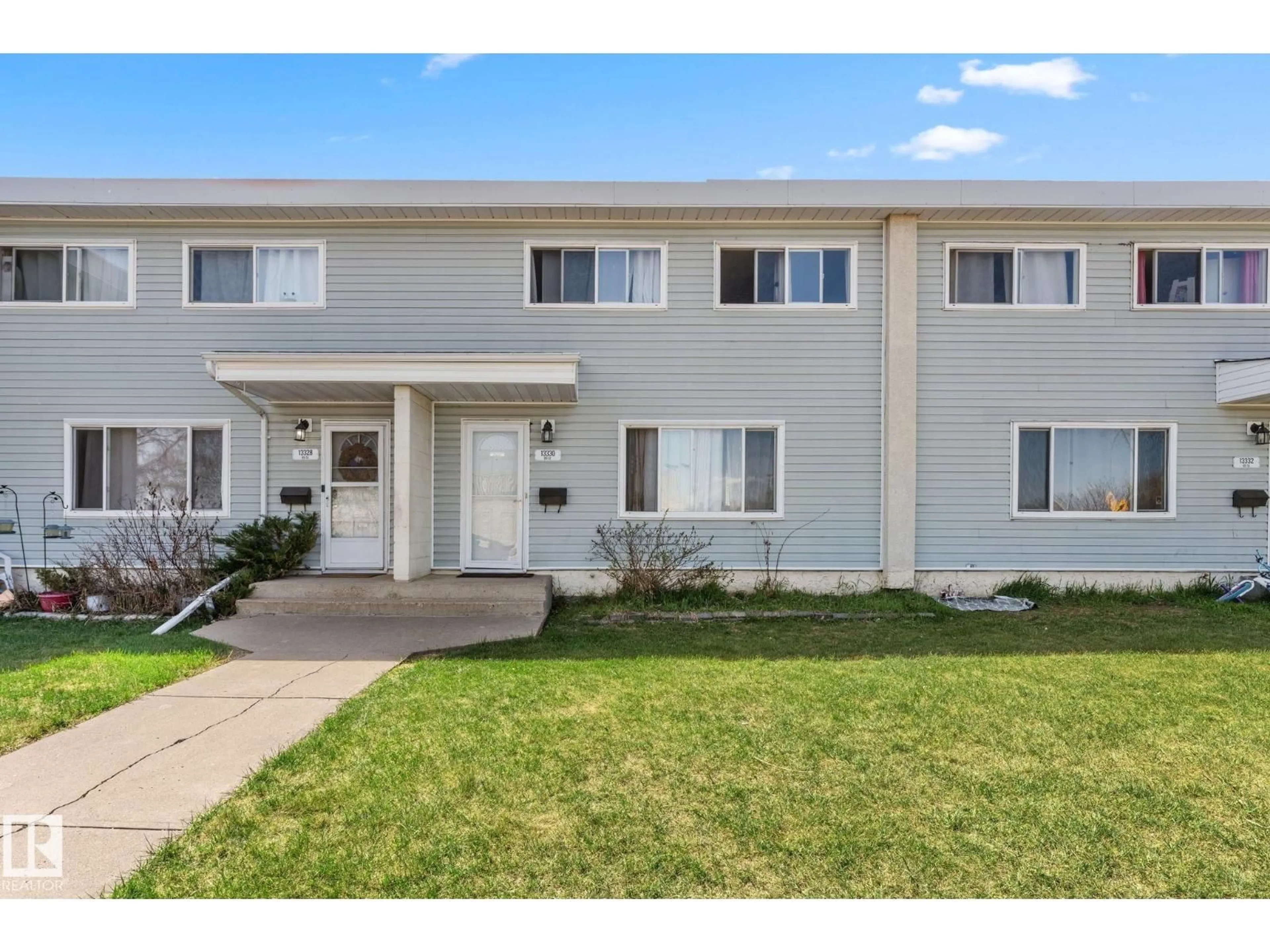 Home with vinyl exterior material, street for 13330 89 ST, Edmonton Alberta T5E3K2