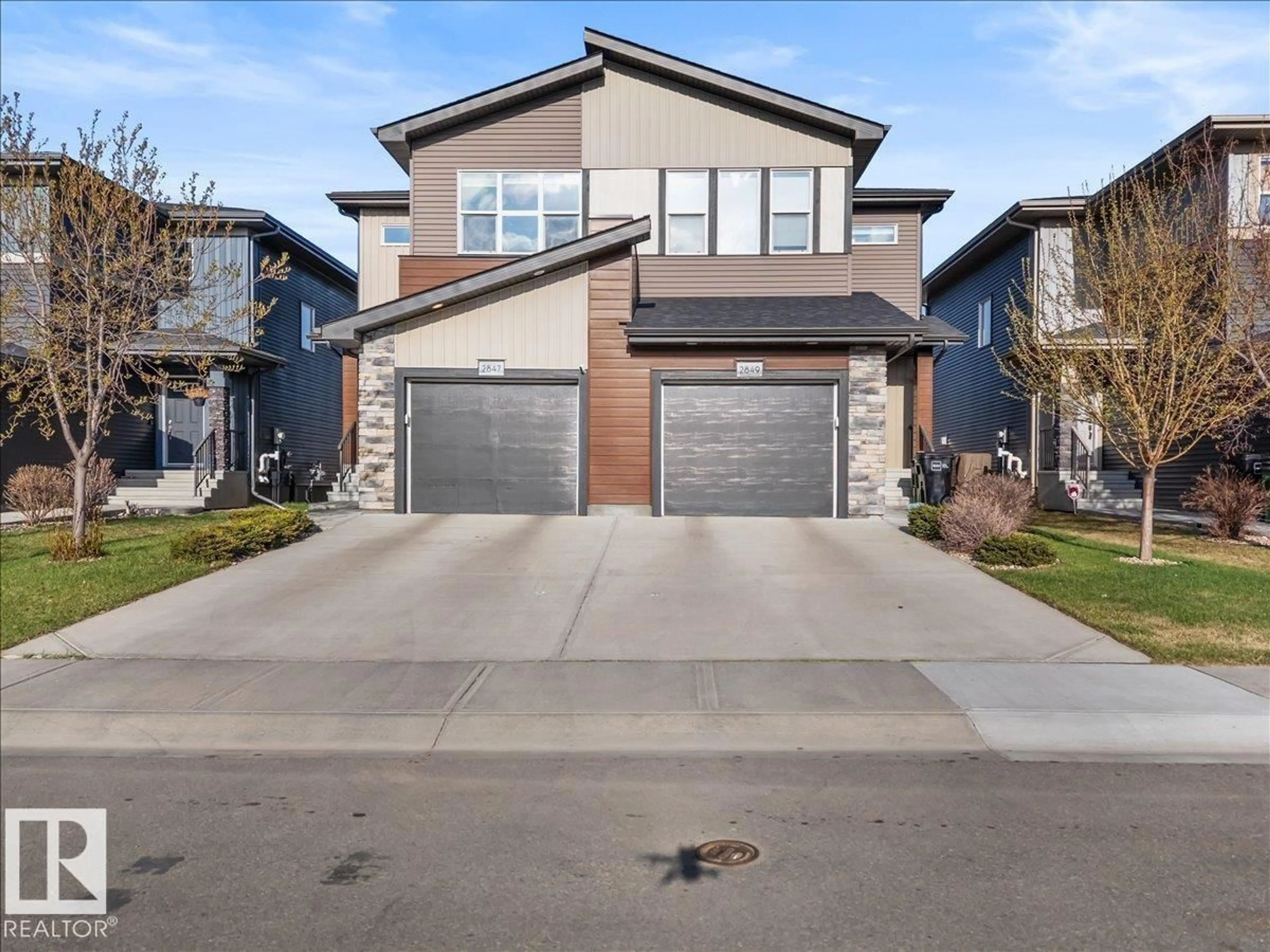 Home with brick exterior material, street for 2847 KOSHAL CR, Edmonton Alberta T6W3J8