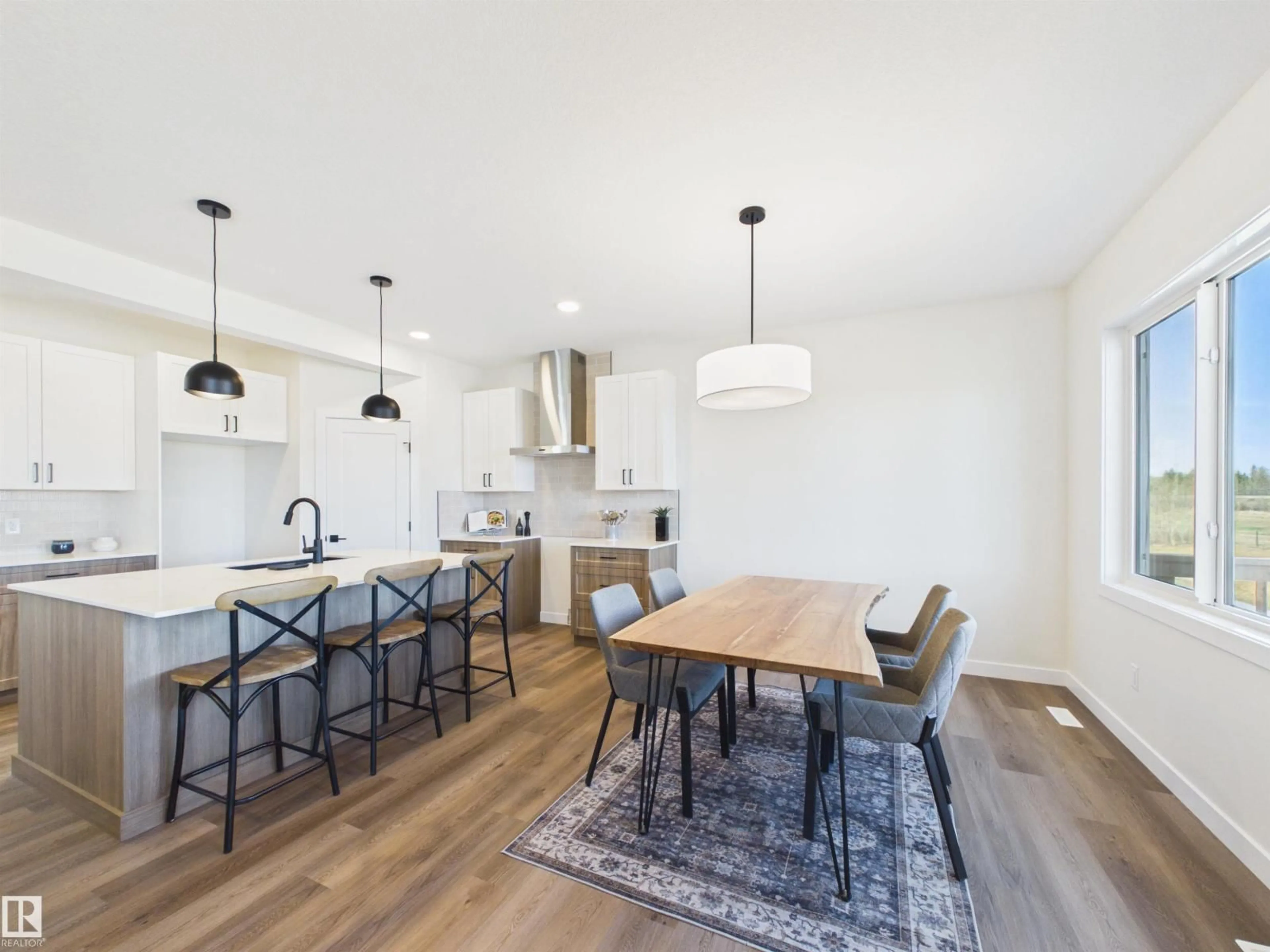 Open concept kitchen, wood/laminate floor for 407 BRICKYARD PT, Stony Plain Alberta T7Z0H9