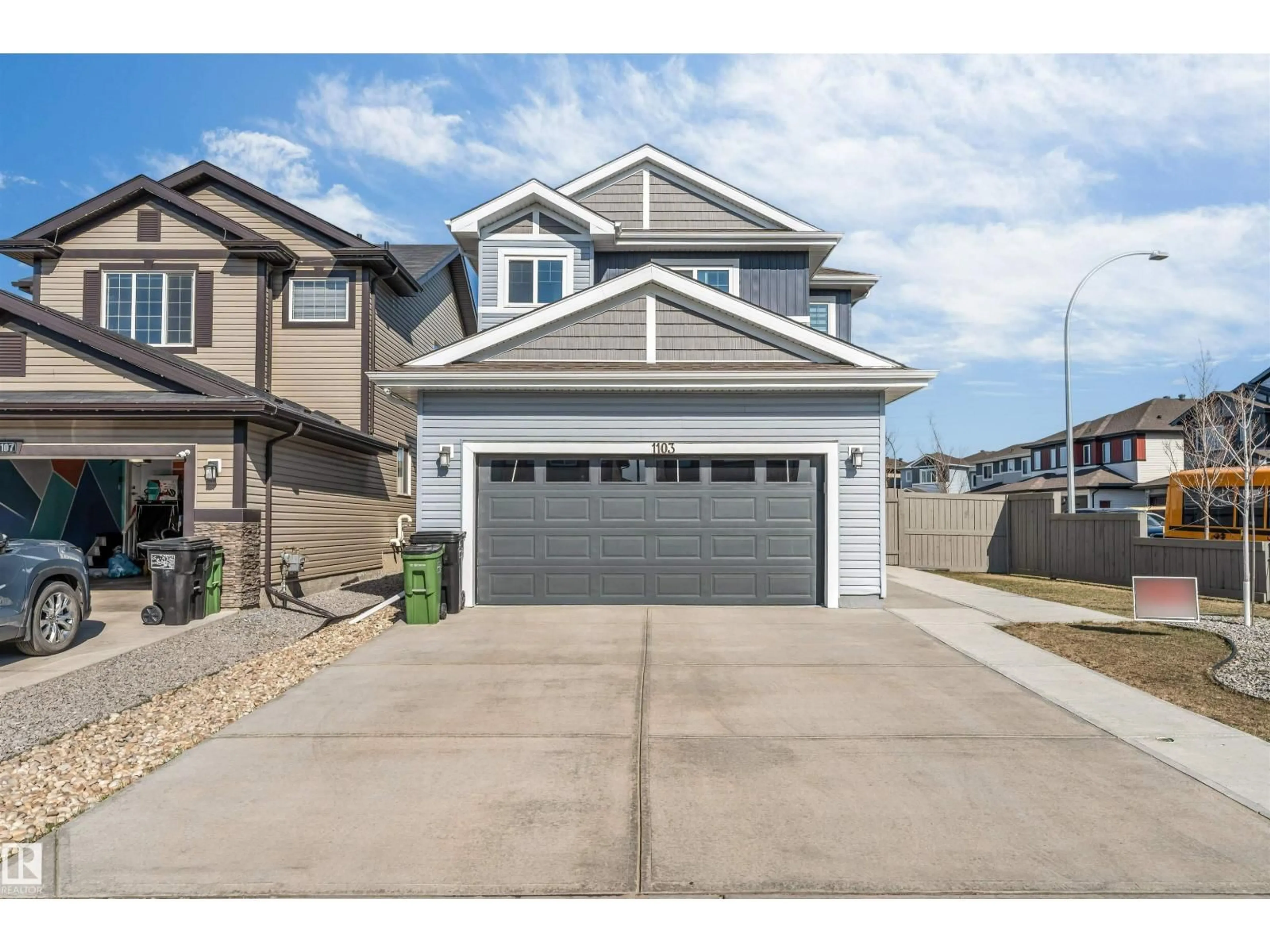 Home with vinyl exterior material, street for 1103 29 ST, Edmonton Alberta T6T2H3