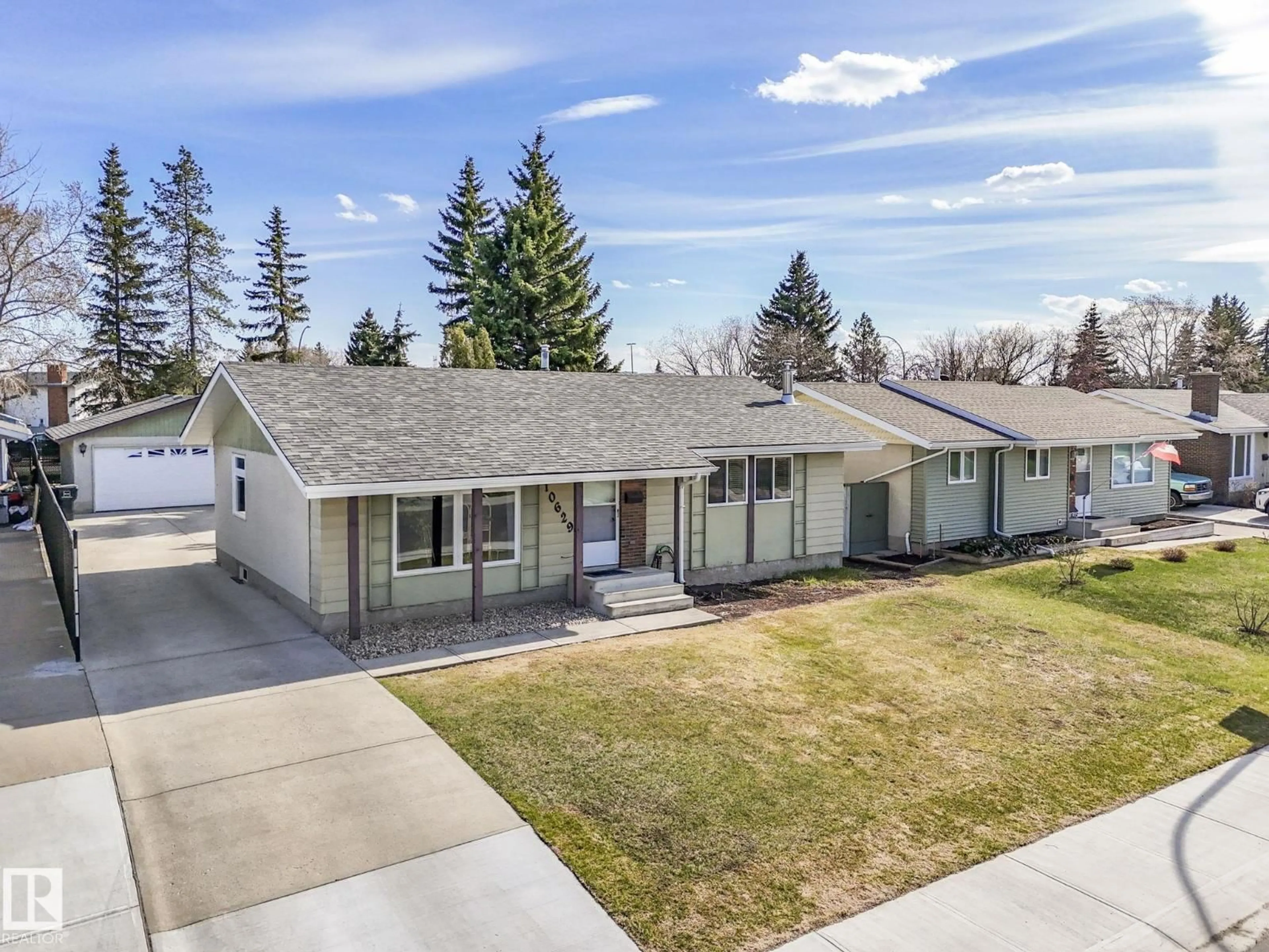 A pic from outside/outdoor area/front of a property/back of a property/a pic from drone, street for NW - 10629 167A AV, Edmonton Alberta T5X2Y9