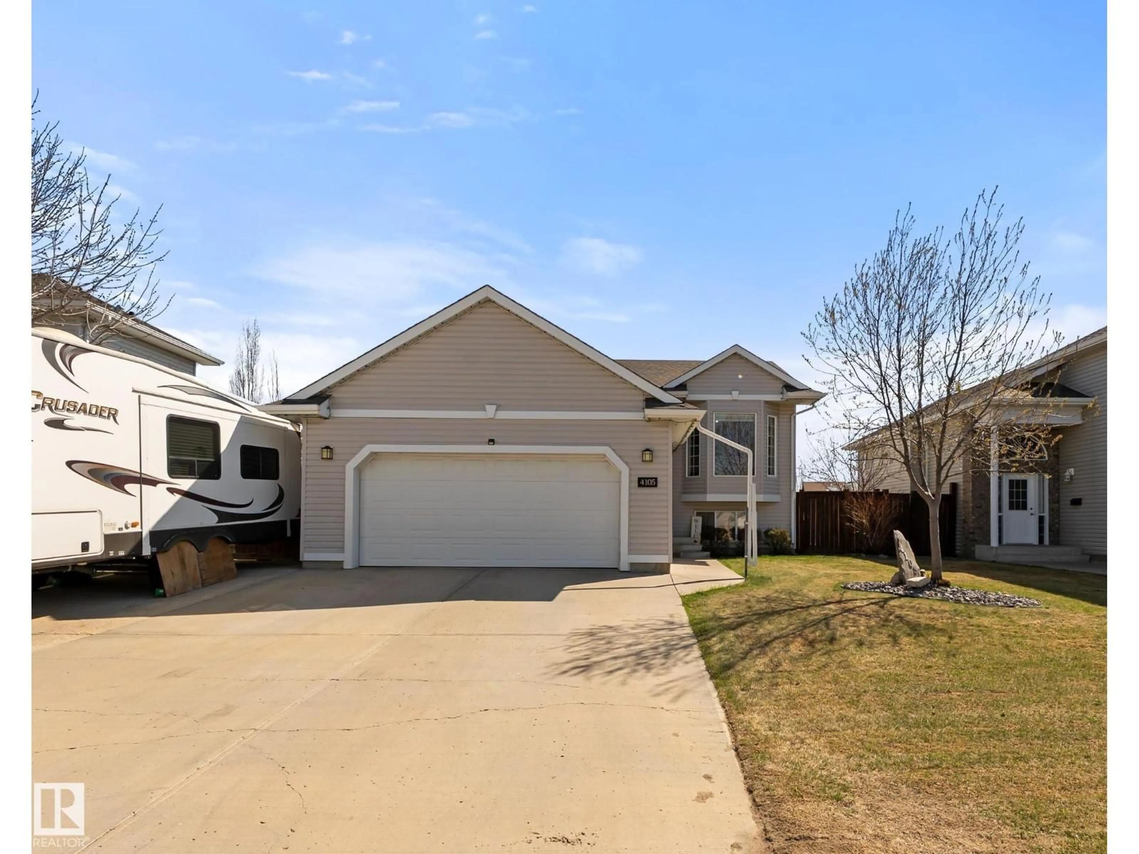 Home with vinyl exterior material, street for 4105 75 ST, Camrose Alberta T4V3W4