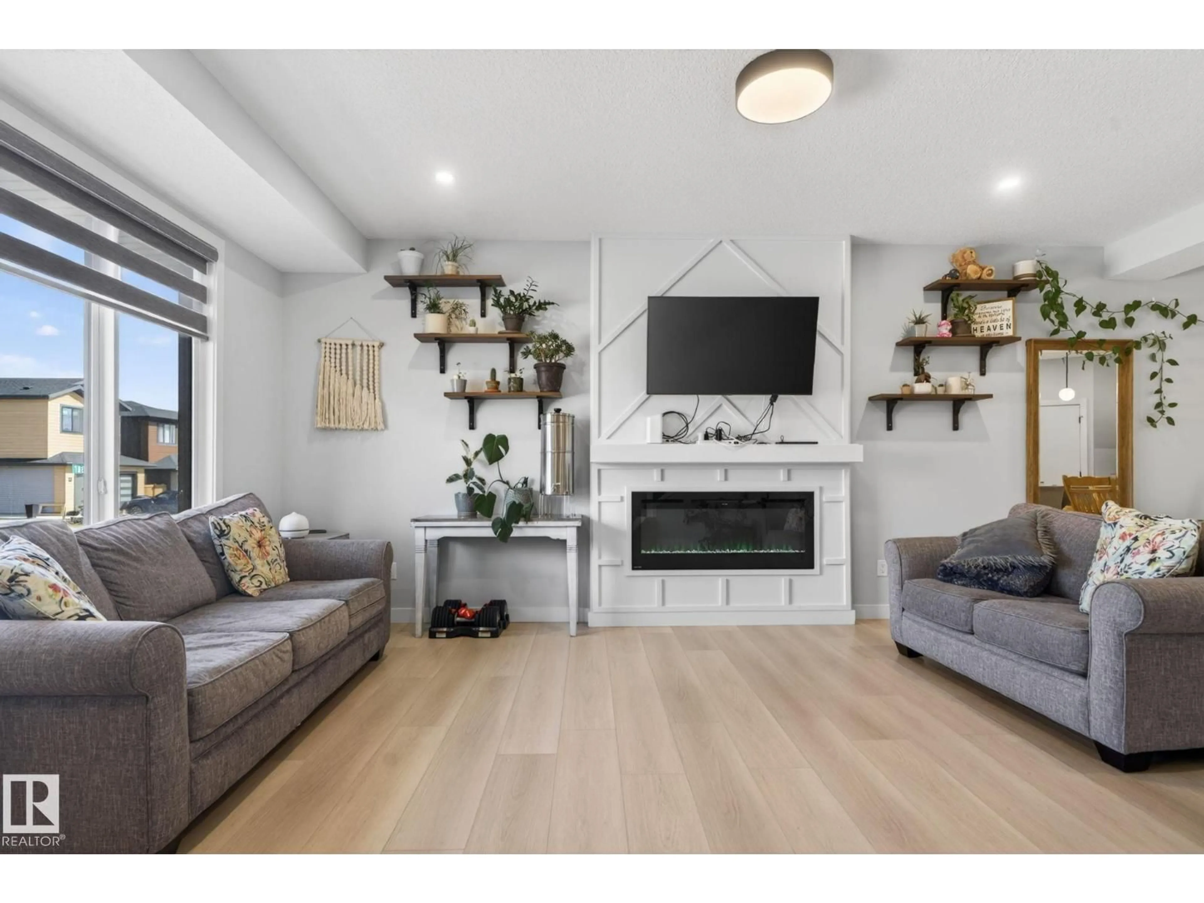 Living room with furniture, wood/laminate floor for 60 TREBLE LD, Spruce Grove Alberta T7X0Z4