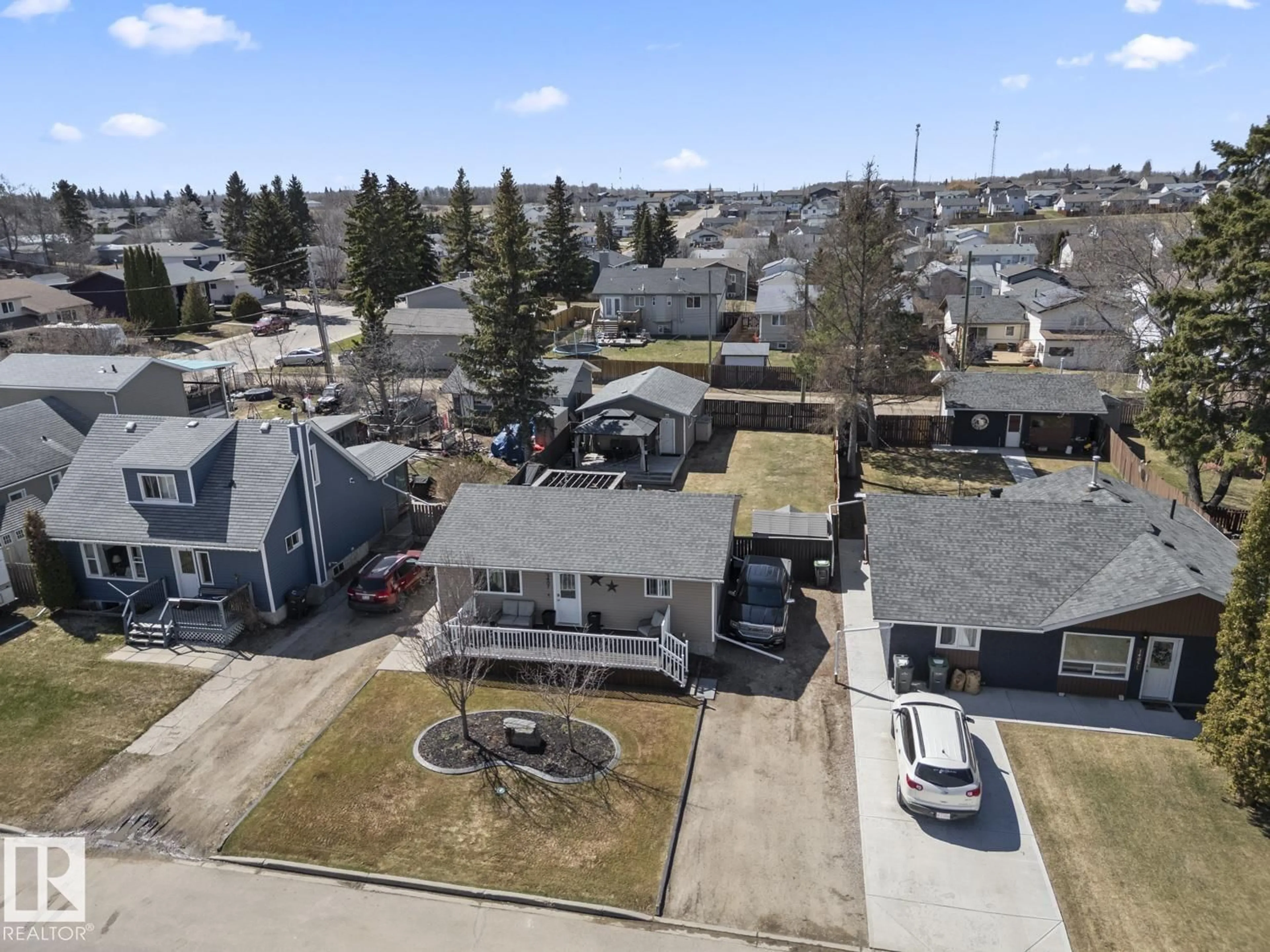 A pic from outside/outdoor area/front of a property/back of a property/a pic from drone, street for 1407 10 ST, Cold Lake Alberta T9M1J6