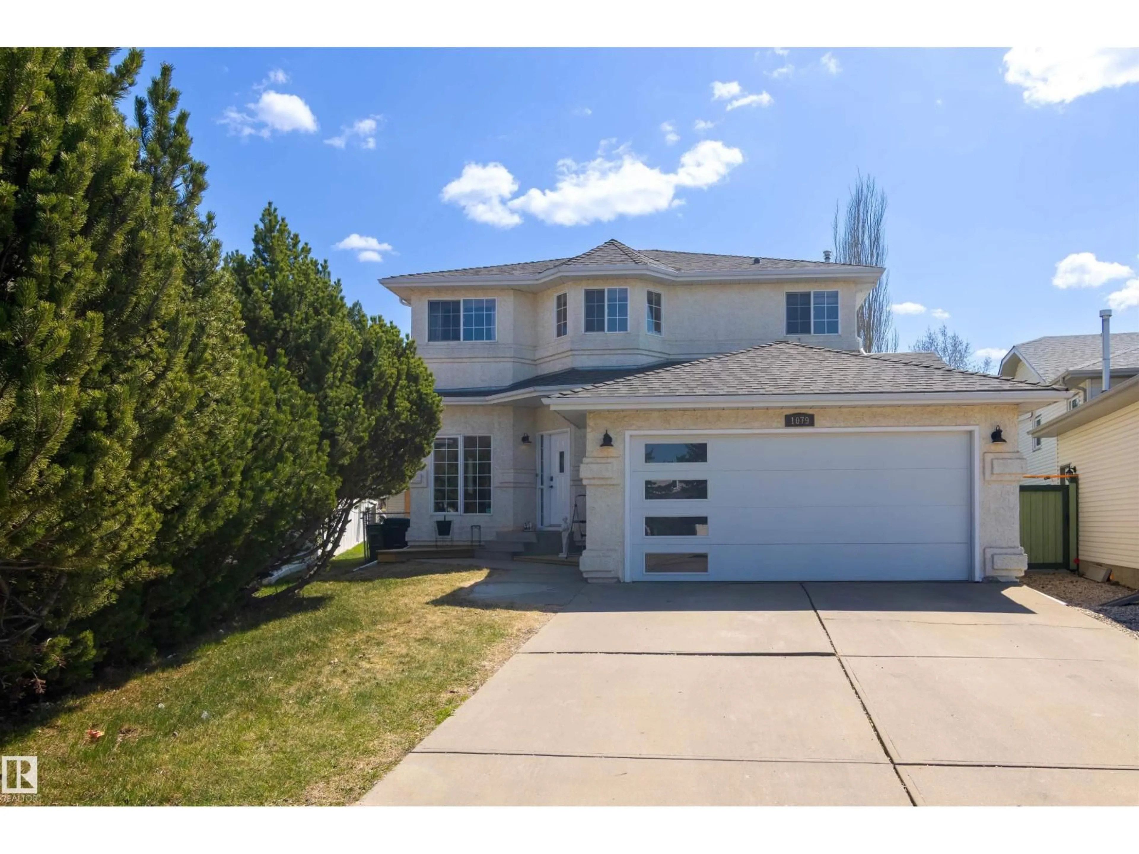 Home with vinyl exterior material, street for 1079 POTTER GREENS DR, Edmonton Alberta T5T6A5