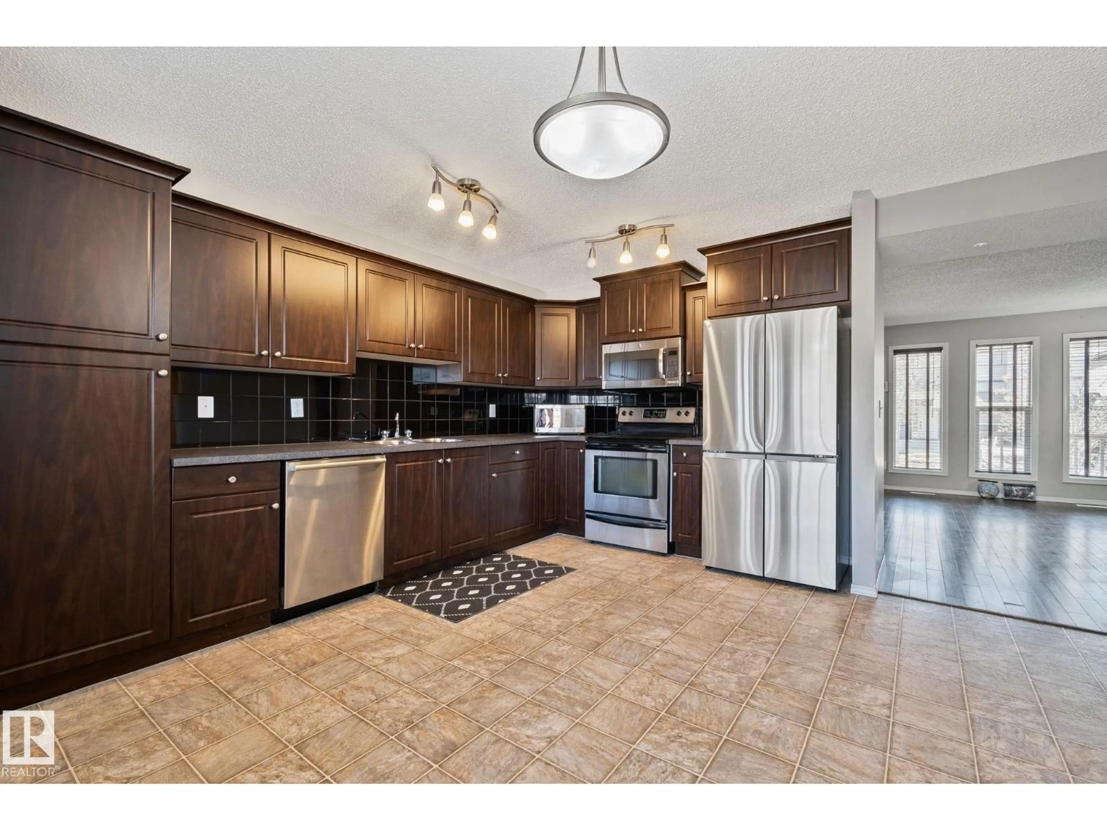 Open concept kitchen, ceramic/tile floor for 6 VIVIAN WY, Spruce Grove Alberta T7X0G9