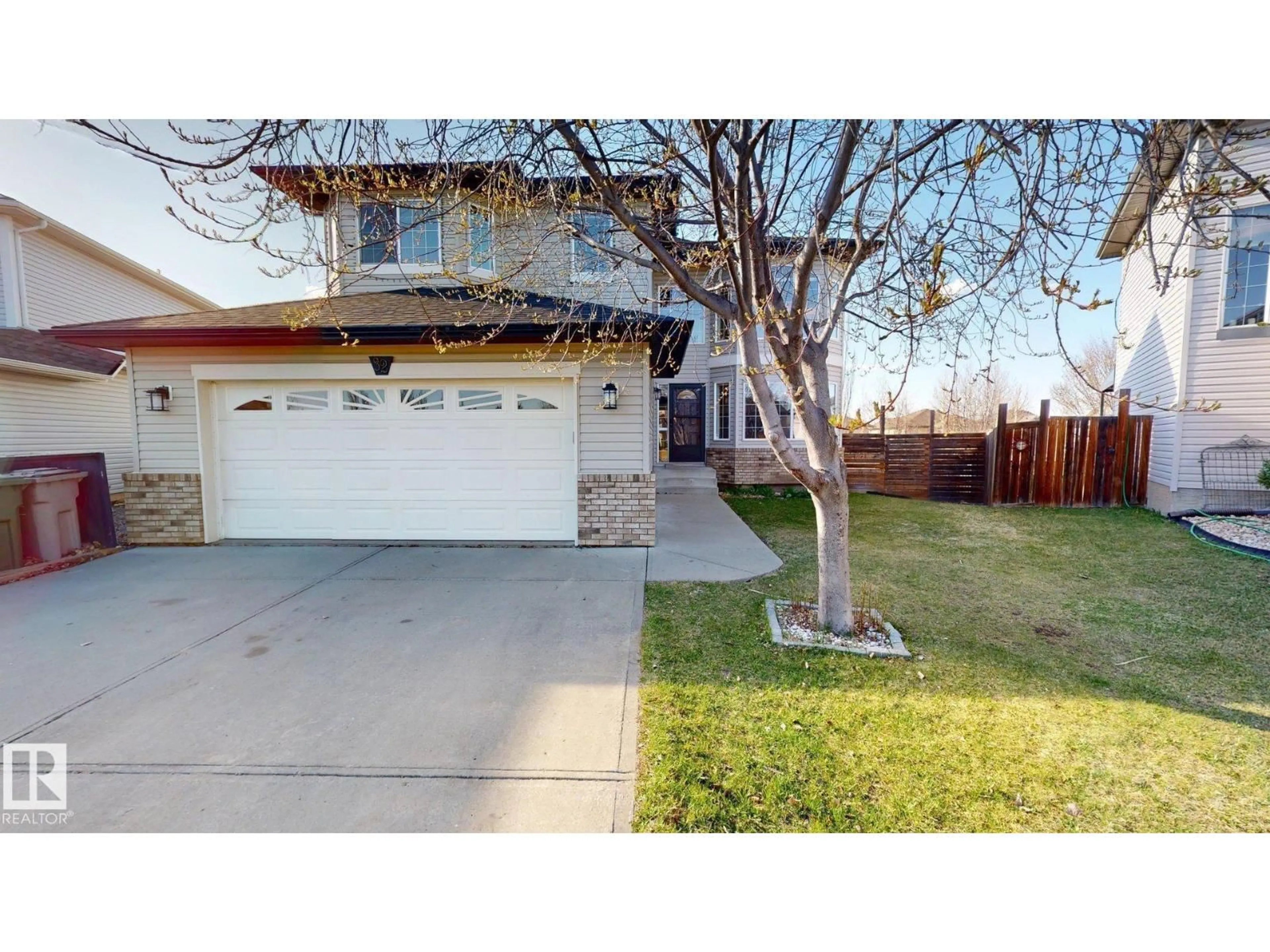 A pic from outside/outdoor area/front of a property/back of a property/a pic from drone, street for 32 CARRIERE CR, Beaumont Alberta T4X0A8