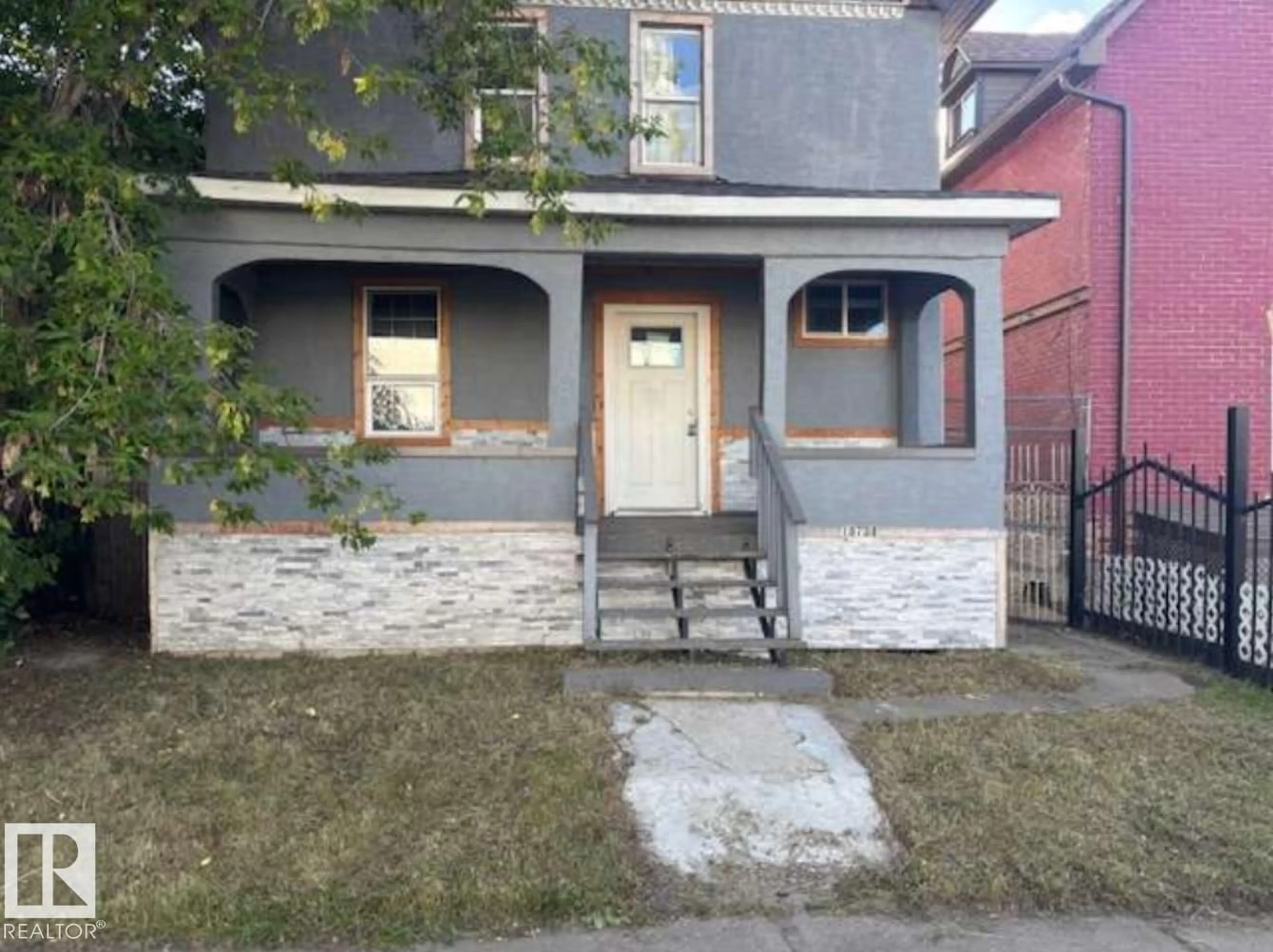 Home with brick exterior material, street for NW - 10730 92 ST, Edmonton Alberta T5H1V4