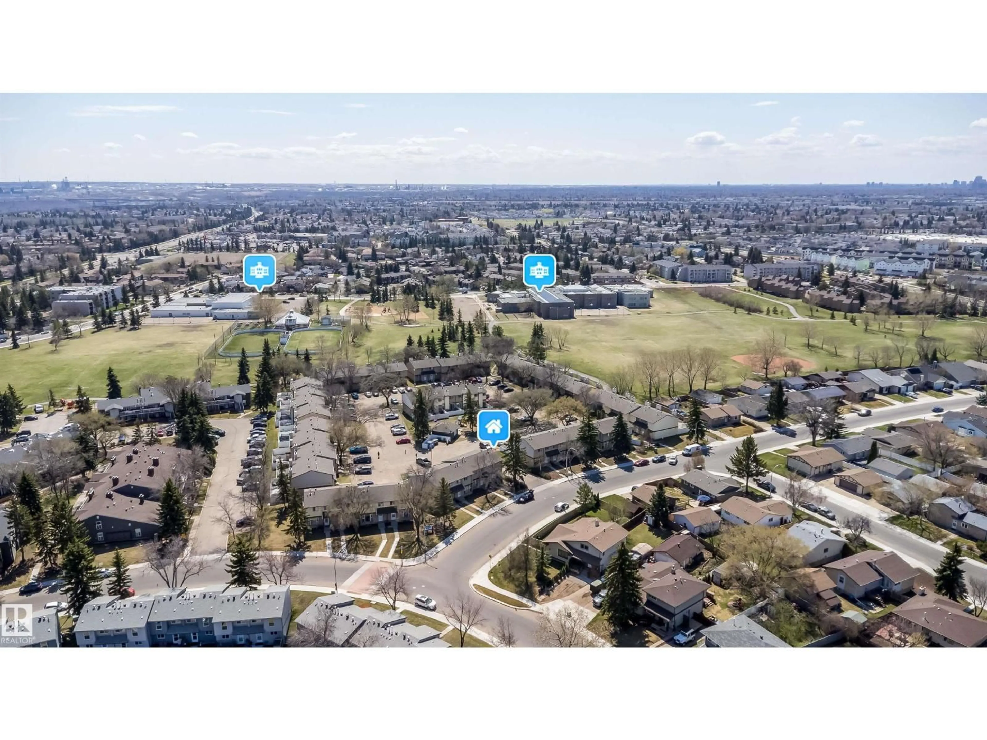 A pic from outside/outdoor area/front of a property/back of a property/a pic from drone, unknown for 3217 142 AV, Edmonton Alberta T5Y1H9