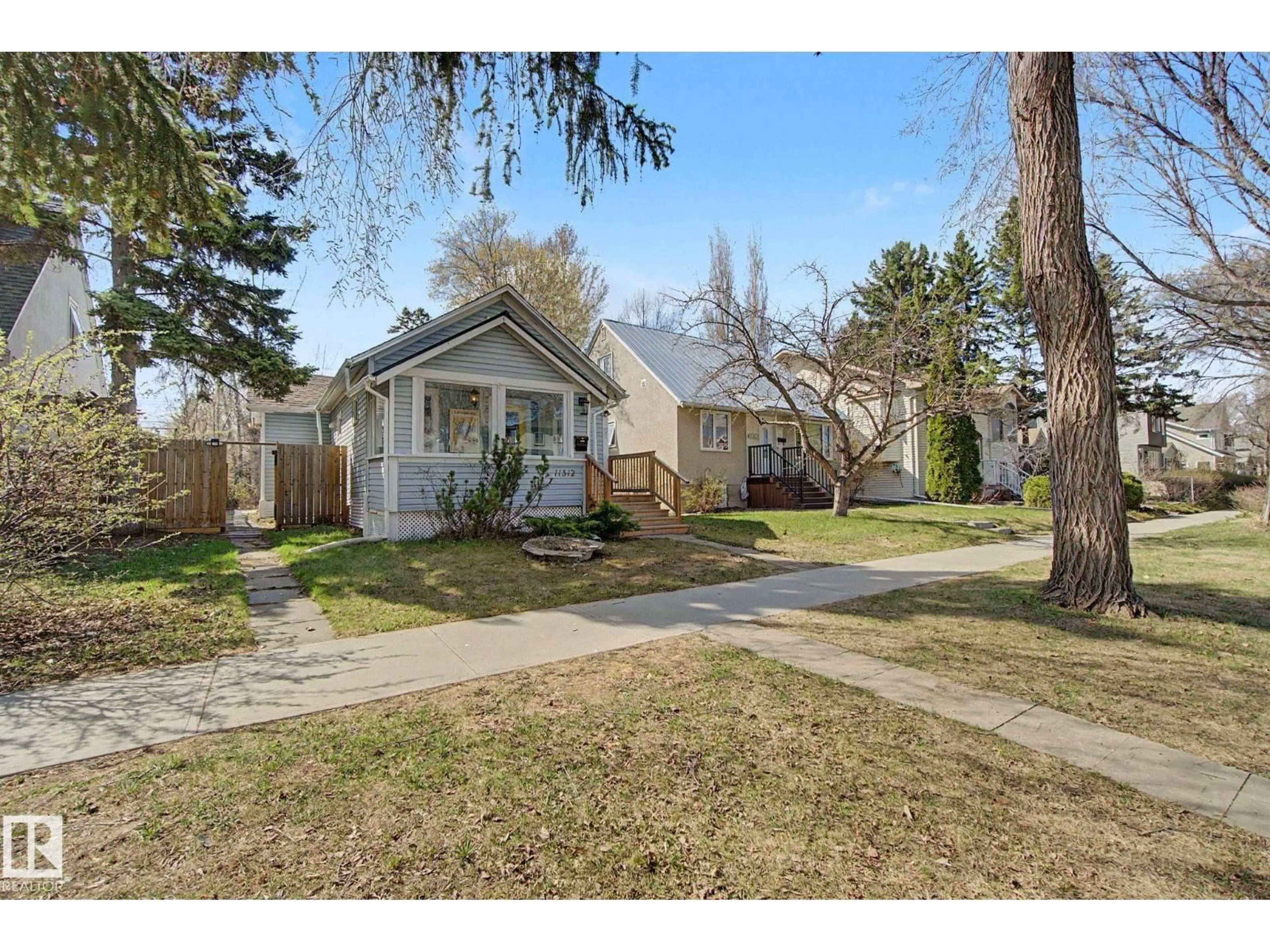 A pic from outside/outdoor area/front of a property/back of a property/a pic from drone, street for NW - 1512 122 ST, Edmonton Alberta T5M0C1