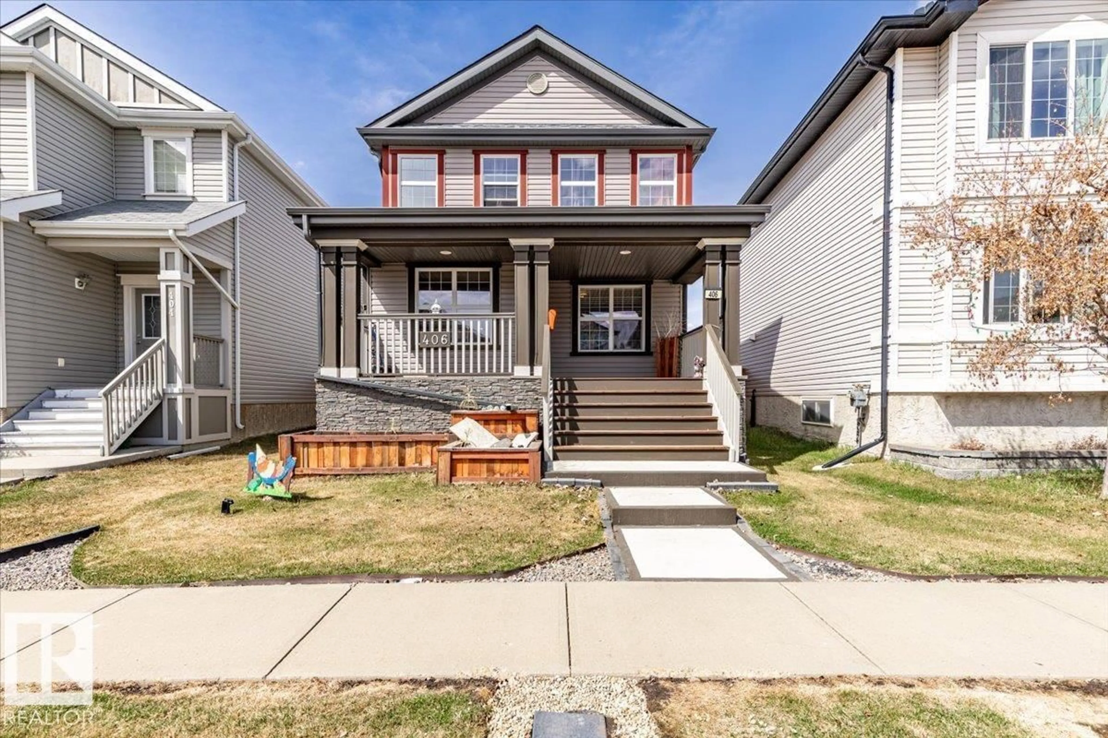 Home with vinyl exterior material, street for 406 SONGHURST PL, Leduc Alberta T9E0P7