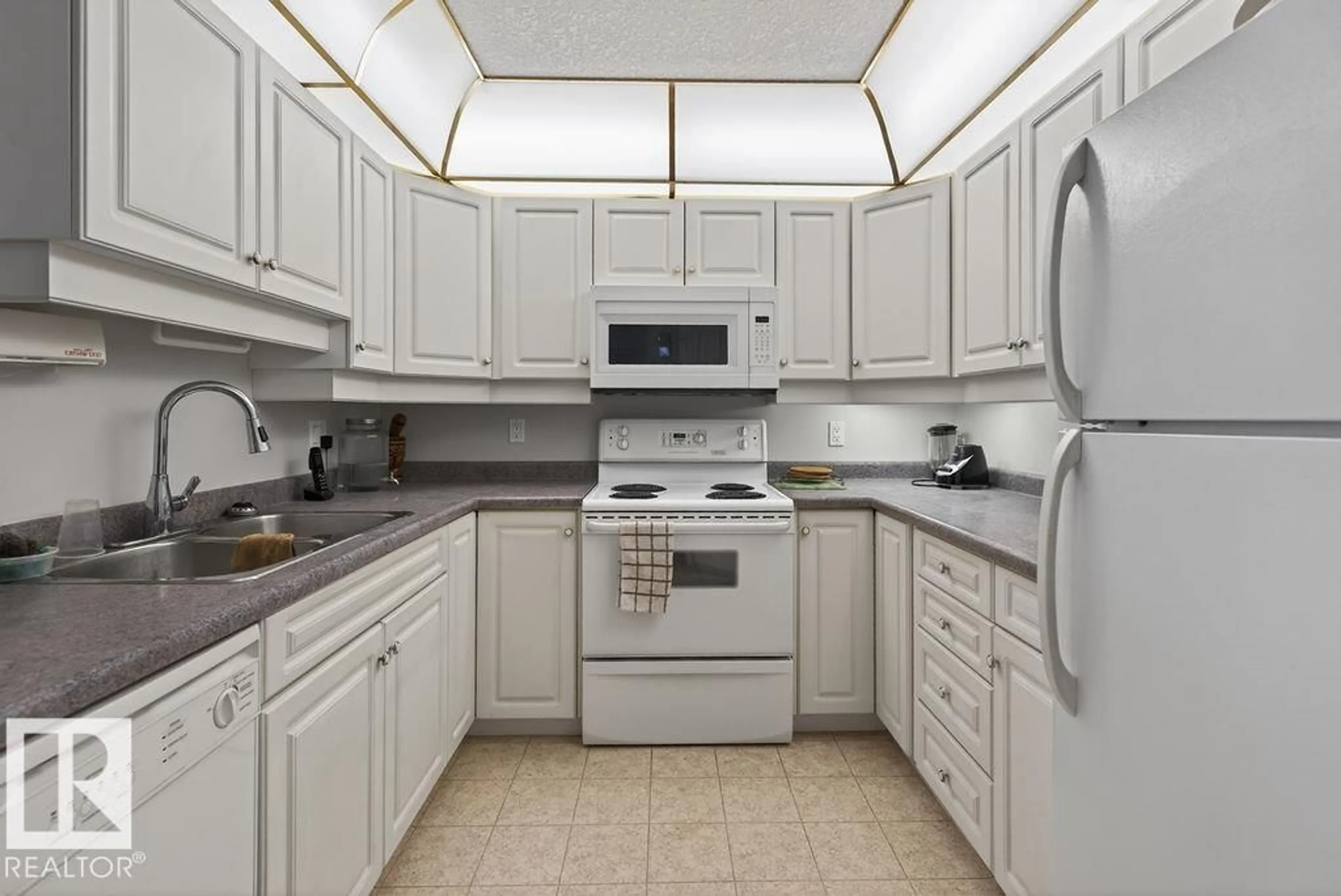 Standard kitchen, ceramic/tile floor for 405 - 6703 172 ST, Edmonton Alberta T5T6H9