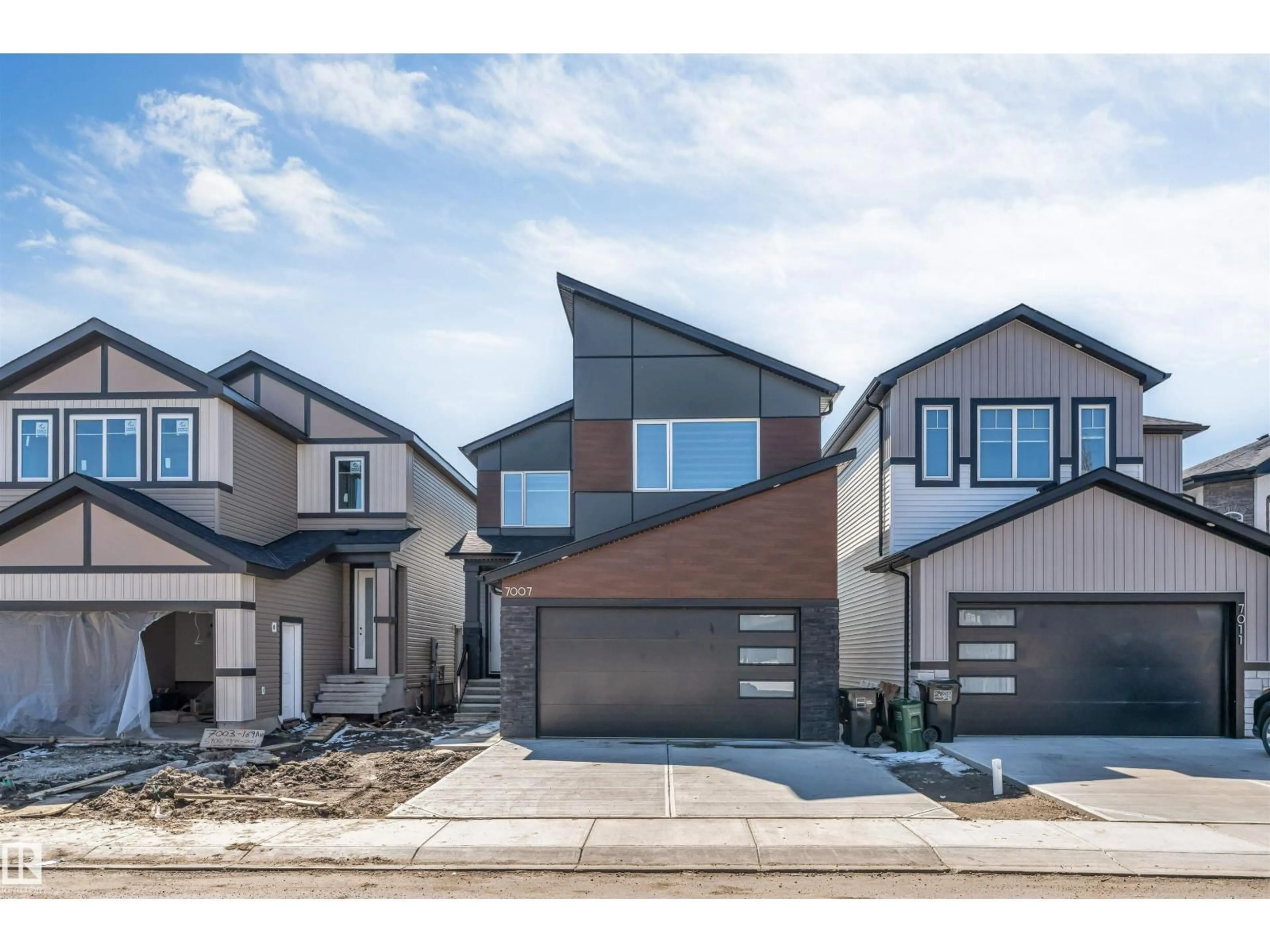 Home with brick exterior material, street for 7007 169 AV, Edmonton Alberta T5Z0H2