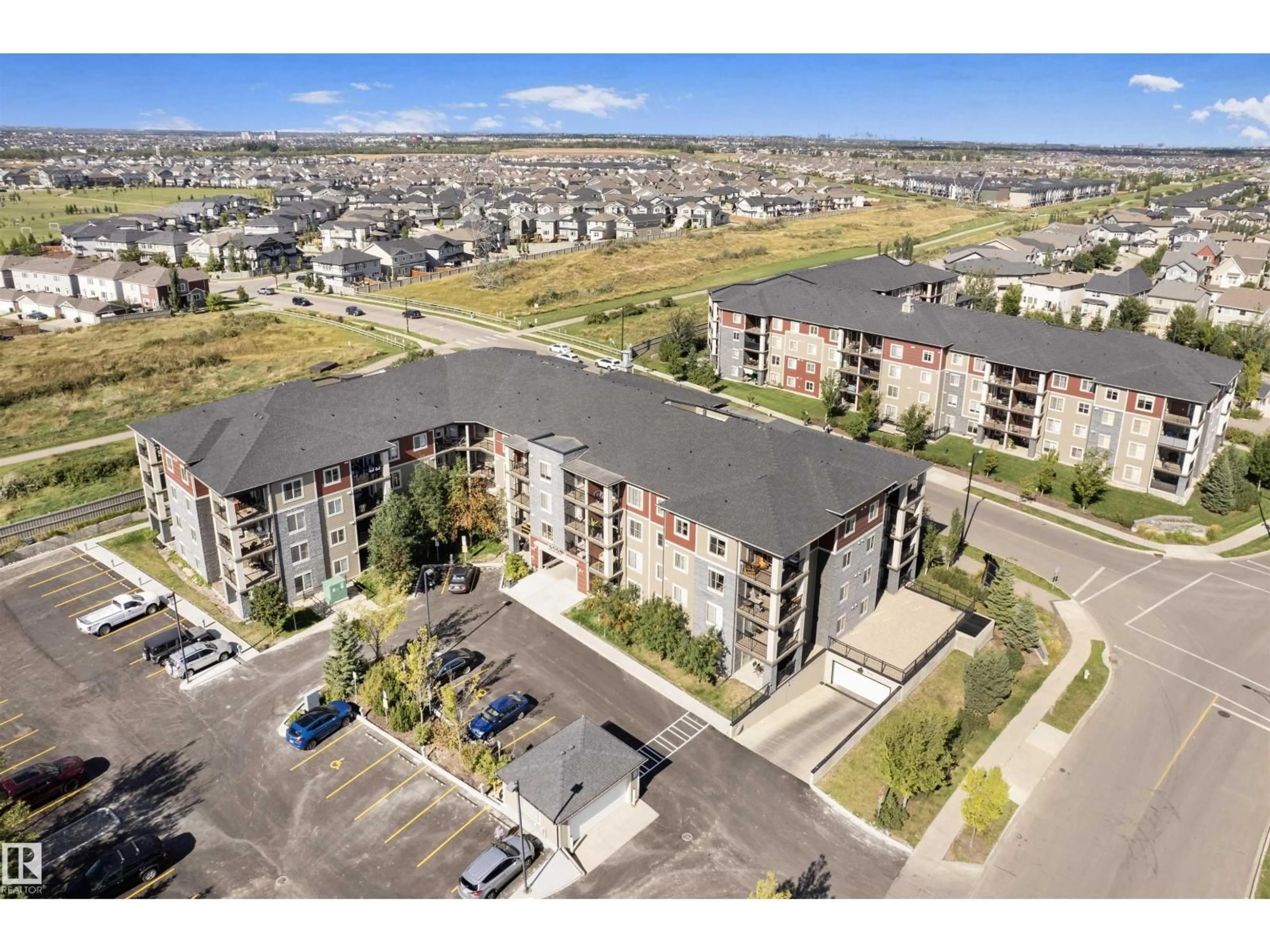 A pic from outside/outdoor area/front of a property/back of a property/a pic from drone, unknown for 313 - 5390 CHAPPELLE RD, Edmonton Alberta T6W3K7