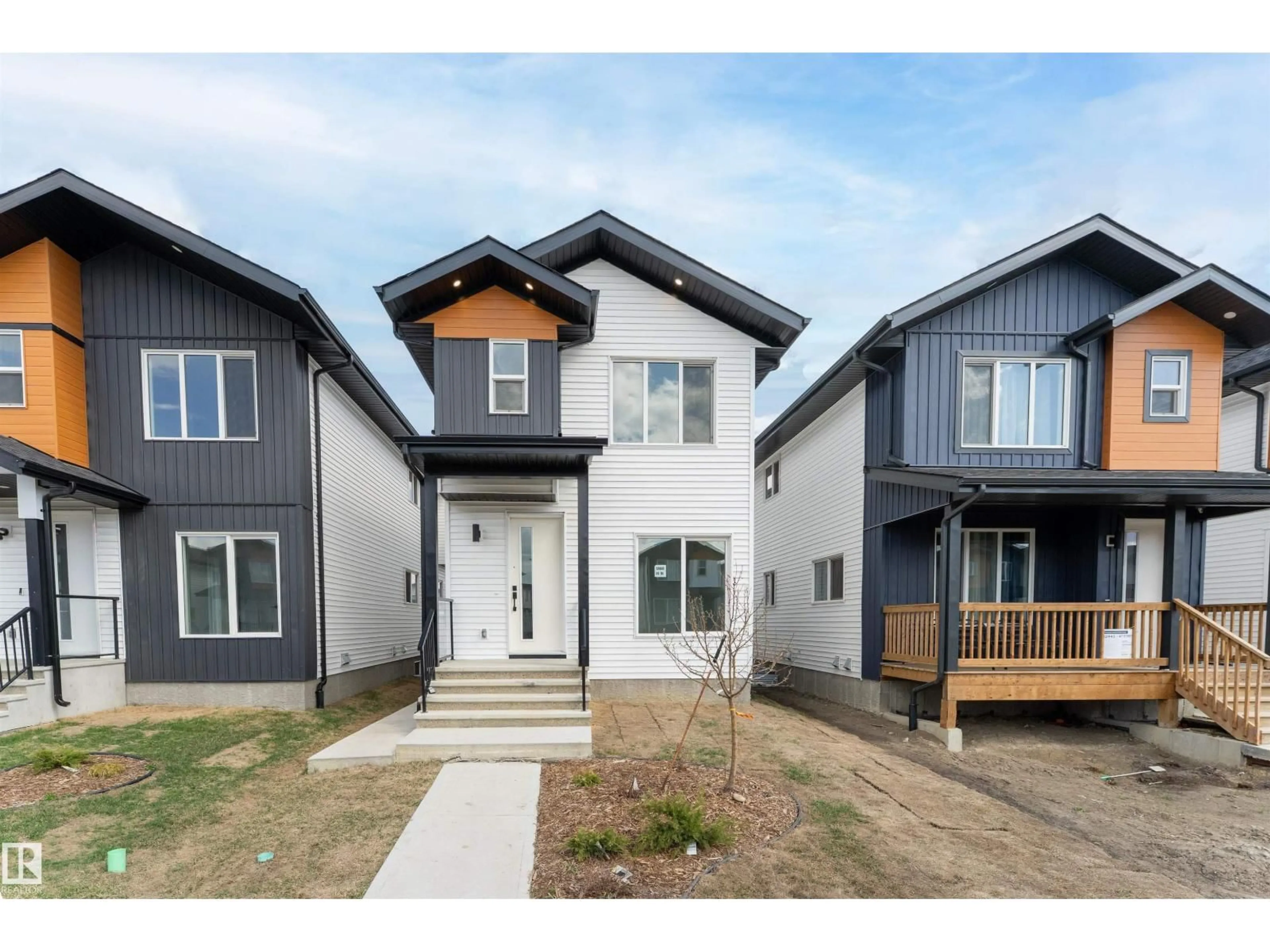 Home with vinyl exterior material, street for 12447 47 ST, Edmonton Alberta T5W5E5