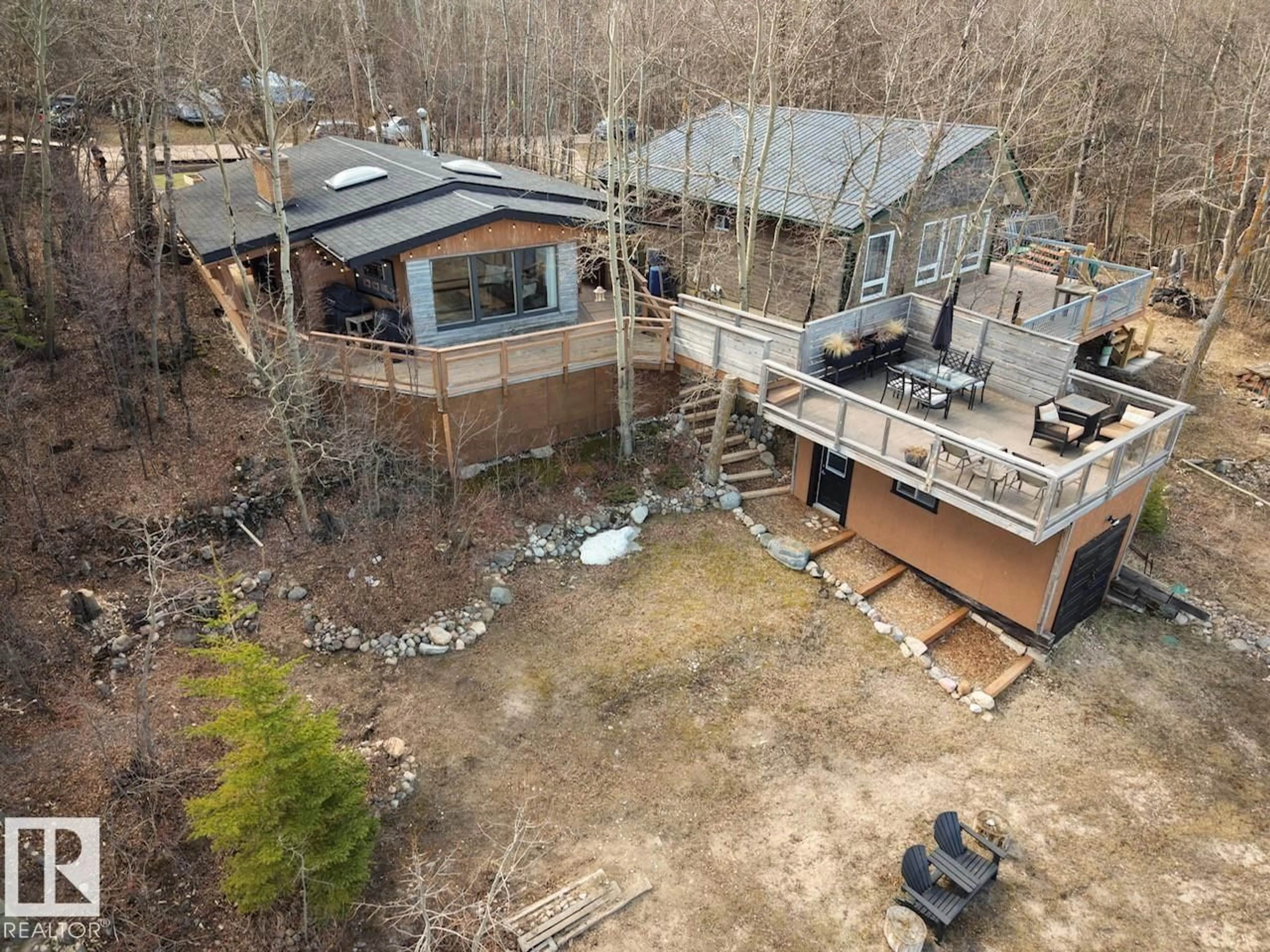 A pic from outside/outdoor area/front of a property/back of a property/a pic from drone, forest/trees view for 197 - 51268 RANGE ROAD 204, Rural Strathcona County Alberta T8G1E9