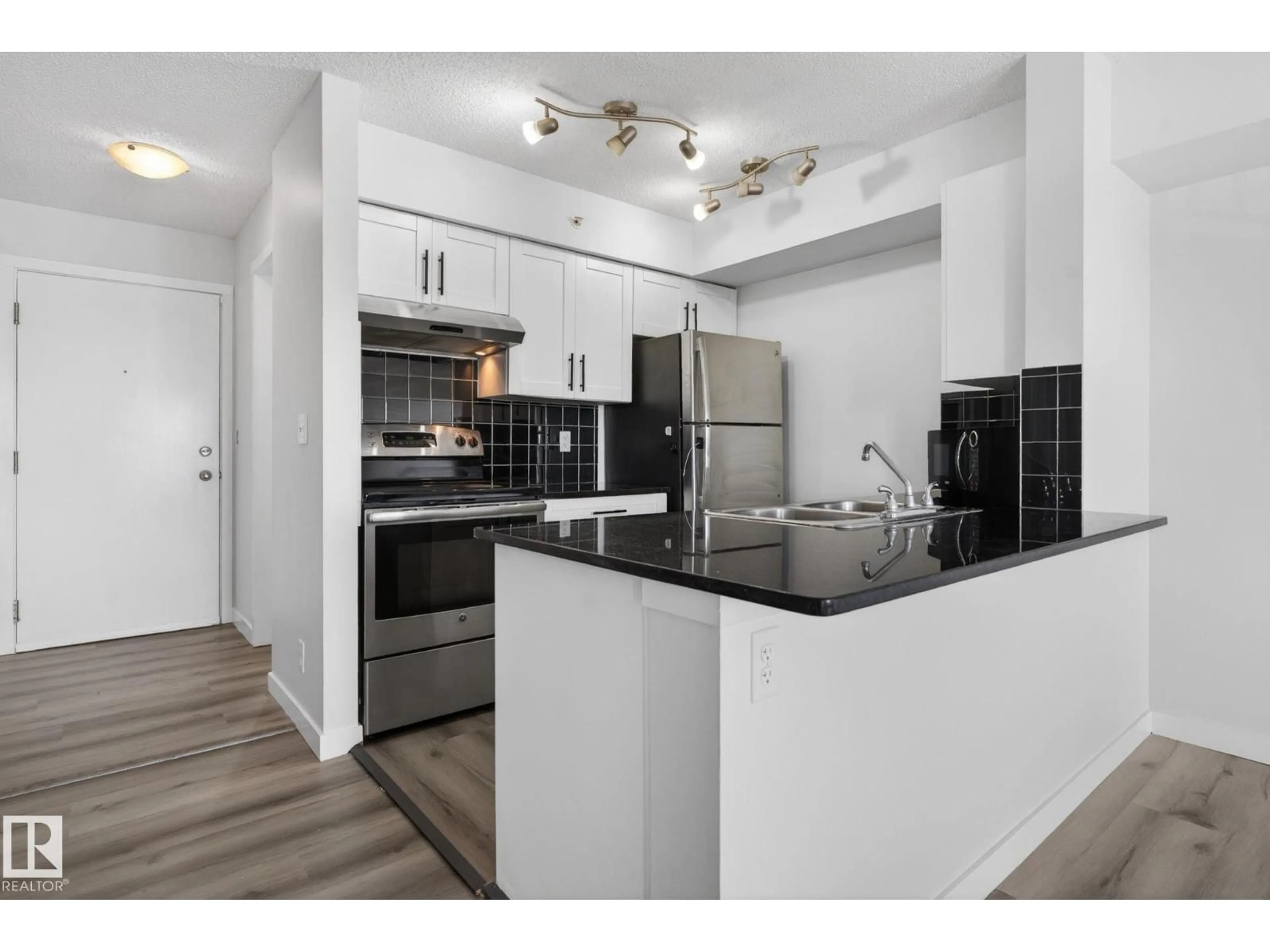 Standard kitchen, unknown for #412 - 3315 JAMES MOWATT TR, Edmonton Alberta T6W3L9