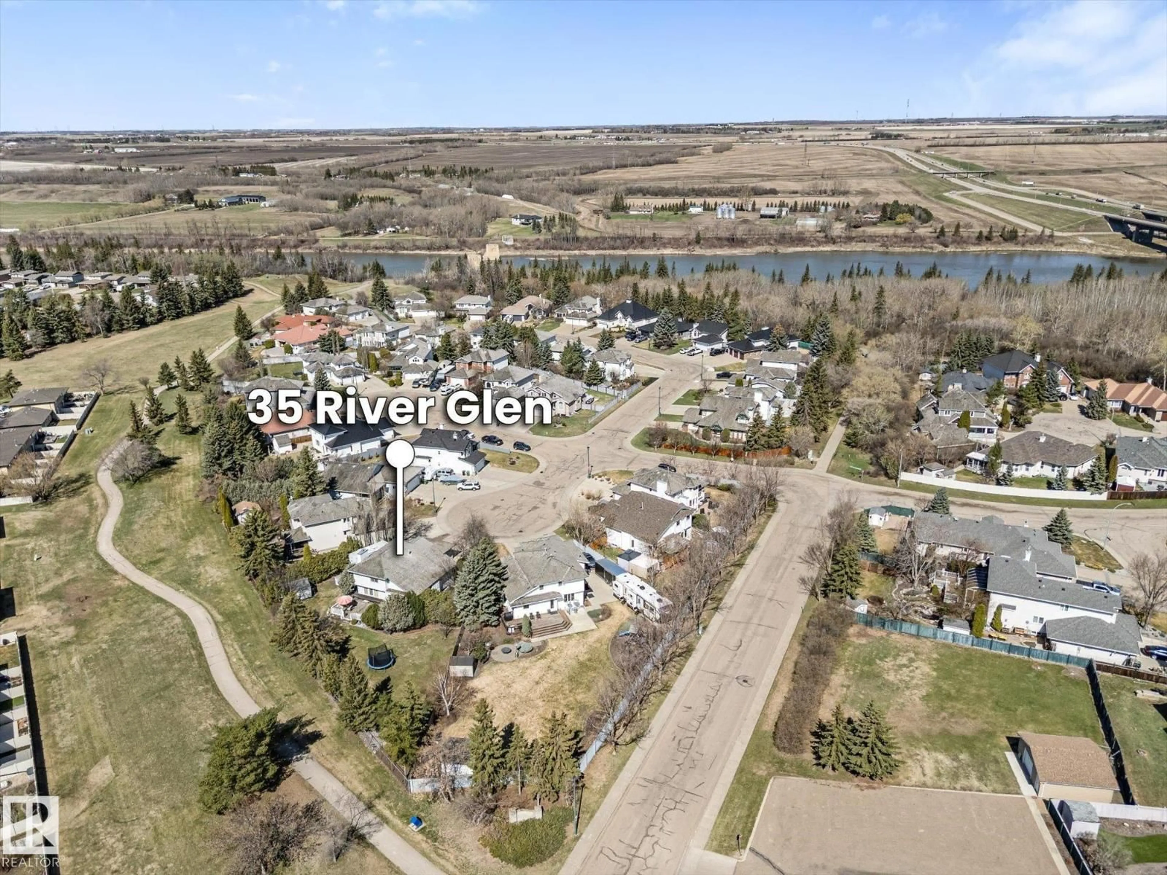 A pic from outside/outdoor area/front of a property/back of a property/a pic from drone, water/lake/river/ocean view for 35 RIVER GL, Fort Saskatchewan Alberta T8L3X8