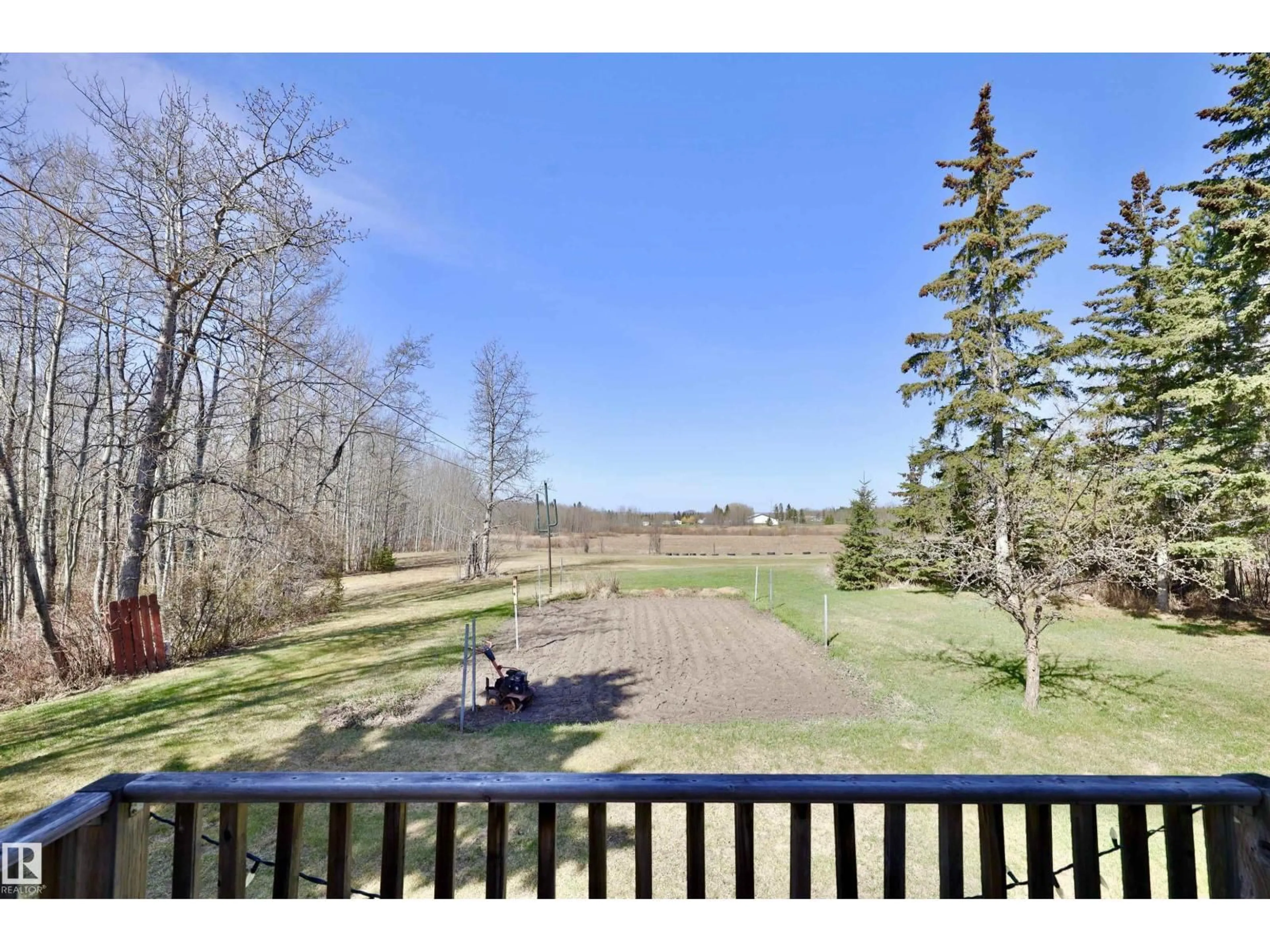 A pic from outside/outdoor area/front of a property/back of a property/a pic from drone, water/lake/river/ocean view for 4701 22 ST, Rural Wetaskiwin County Alberta T0C2C0