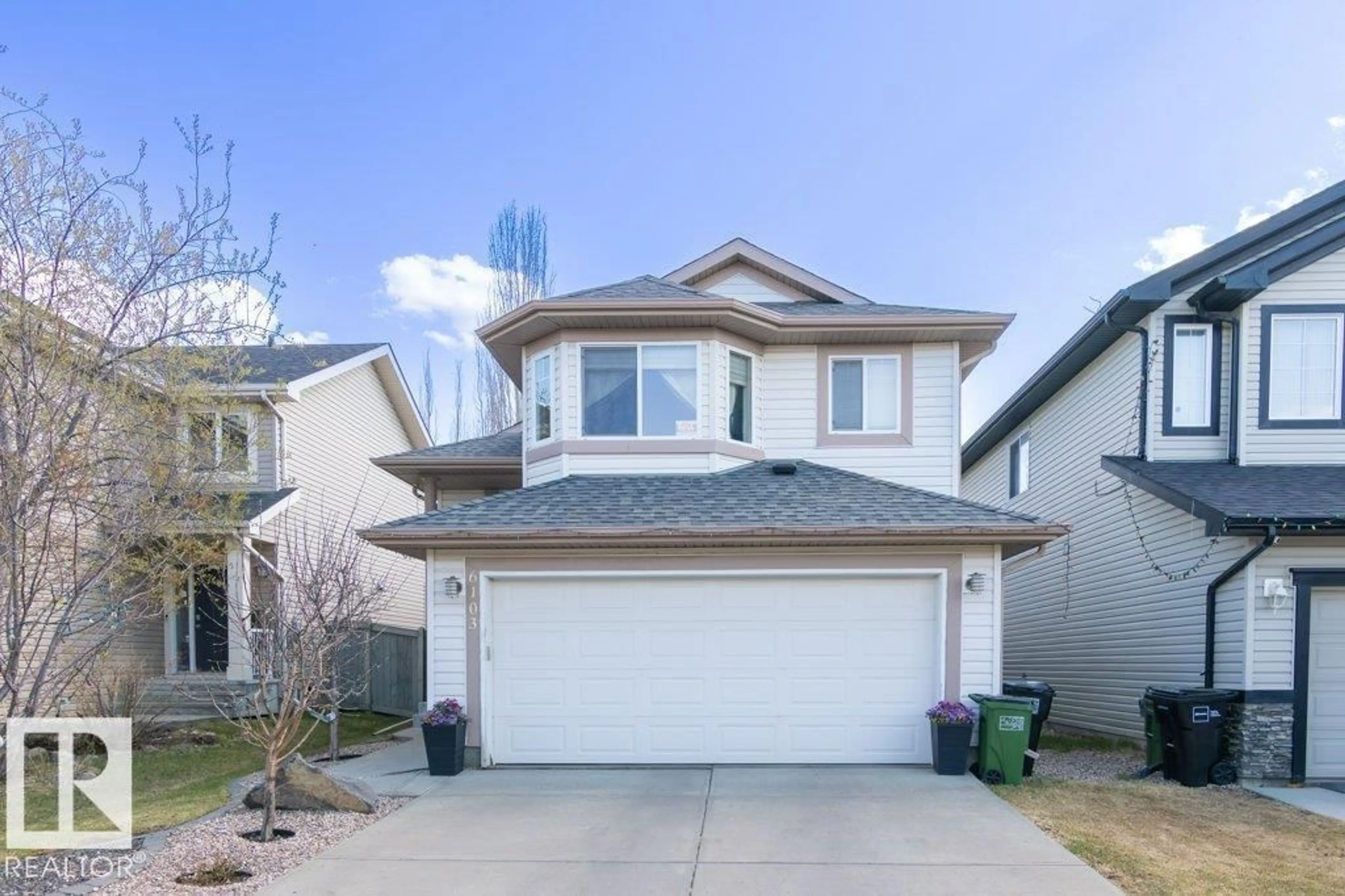 Home with vinyl exterior material, street for SW - 6103 5 AV, Edmonton Alberta T6X0E8