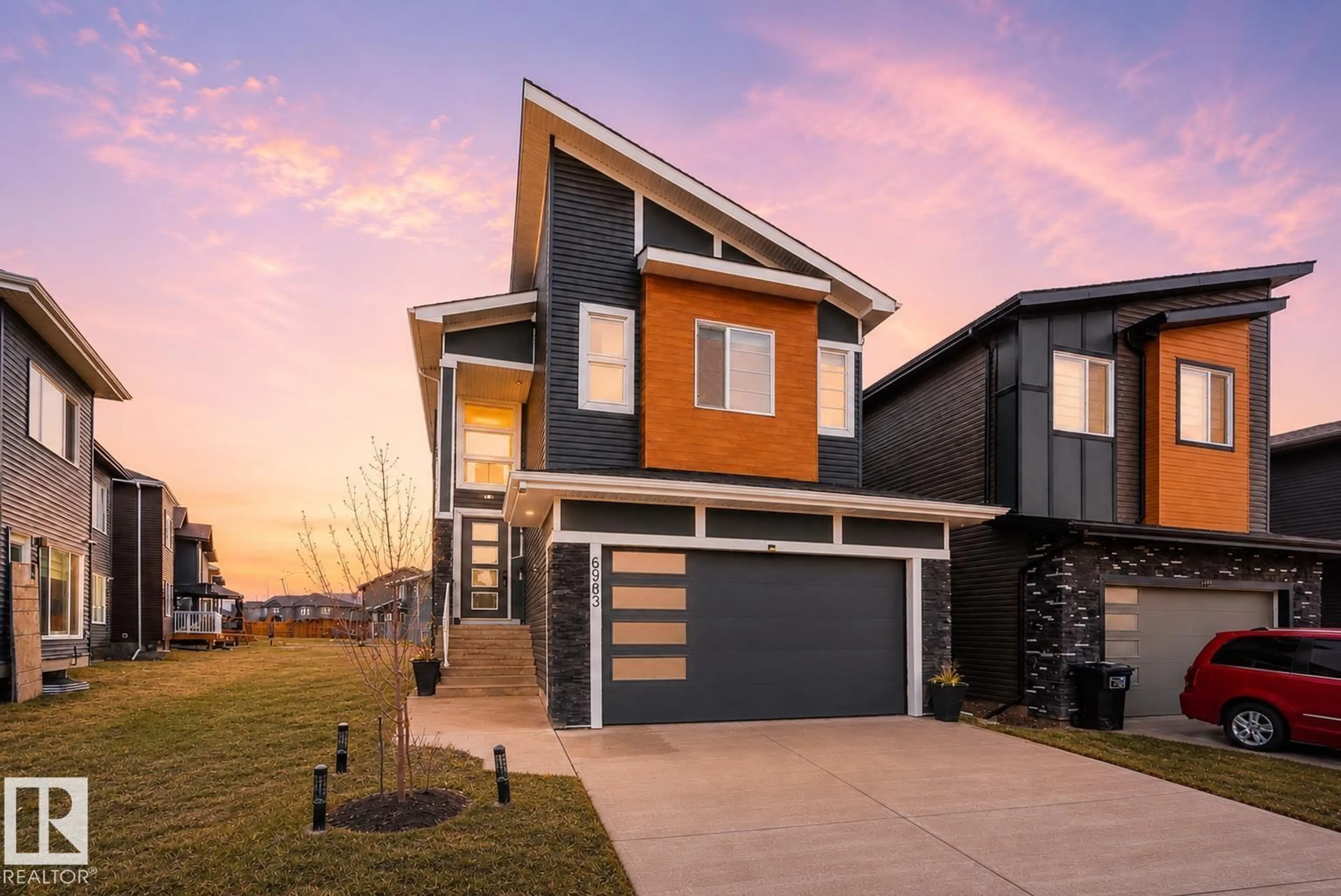 Home with vinyl exterior material, street for NW - 6903 173 AV, Edmonton Alberta T5Z0W4