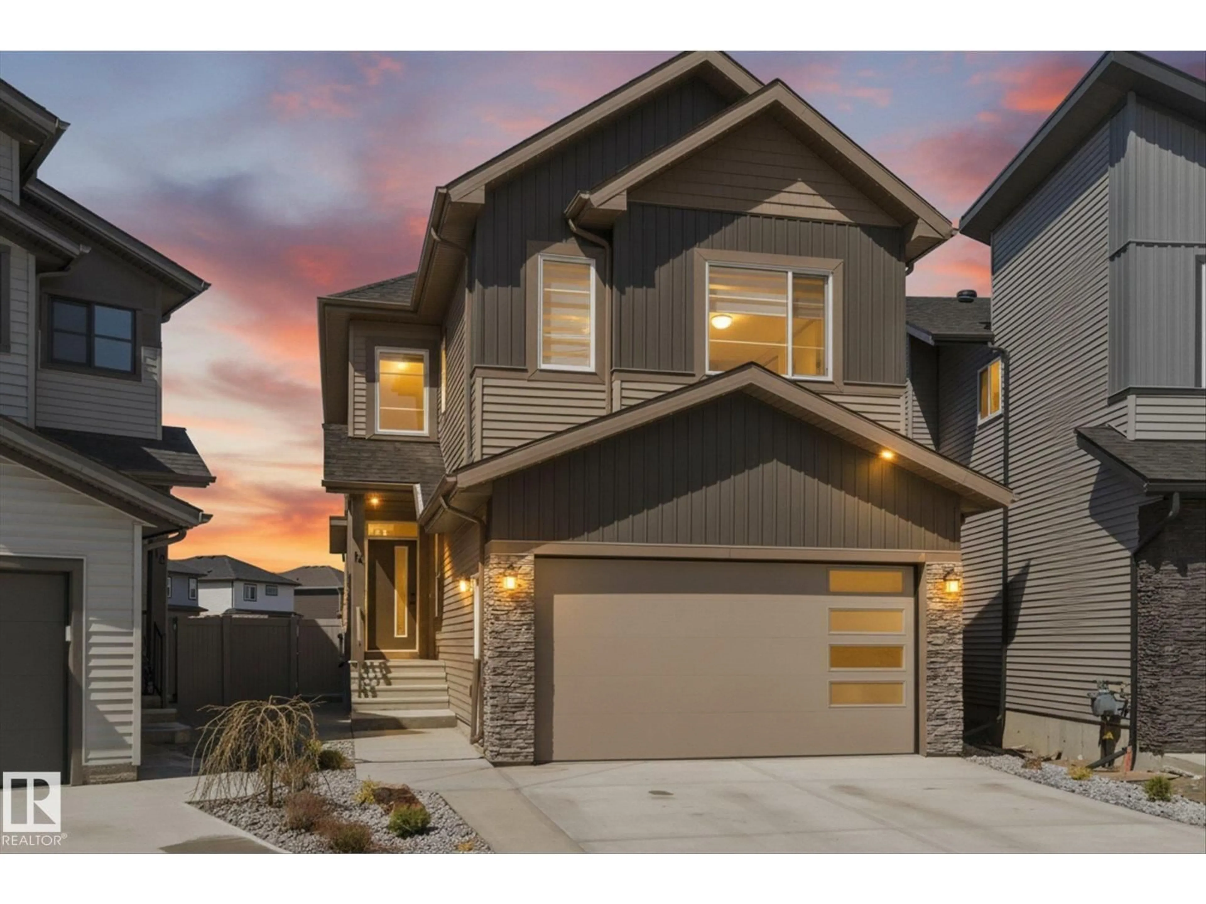 Home with vinyl exterior material, street for 14 ENNS CT, Fort Saskatchewan Alberta T8L0Z4