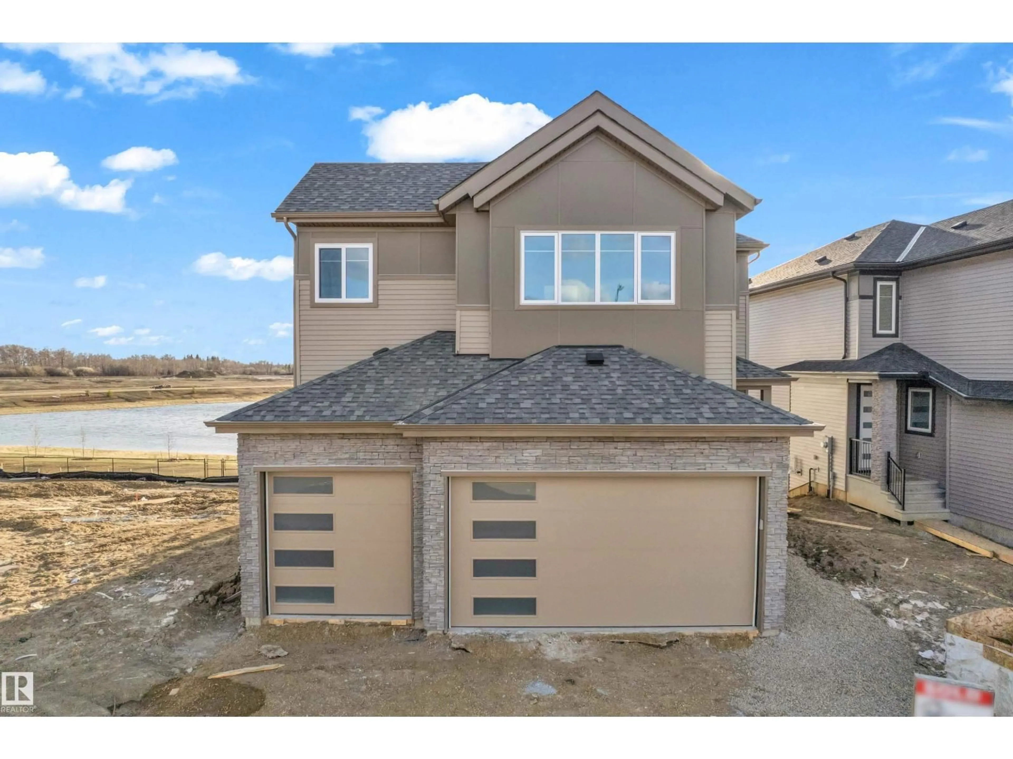Home with vinyl exterior material, street for 213 CRYSTAL CREEK, Leduc Alberta T9E0X6