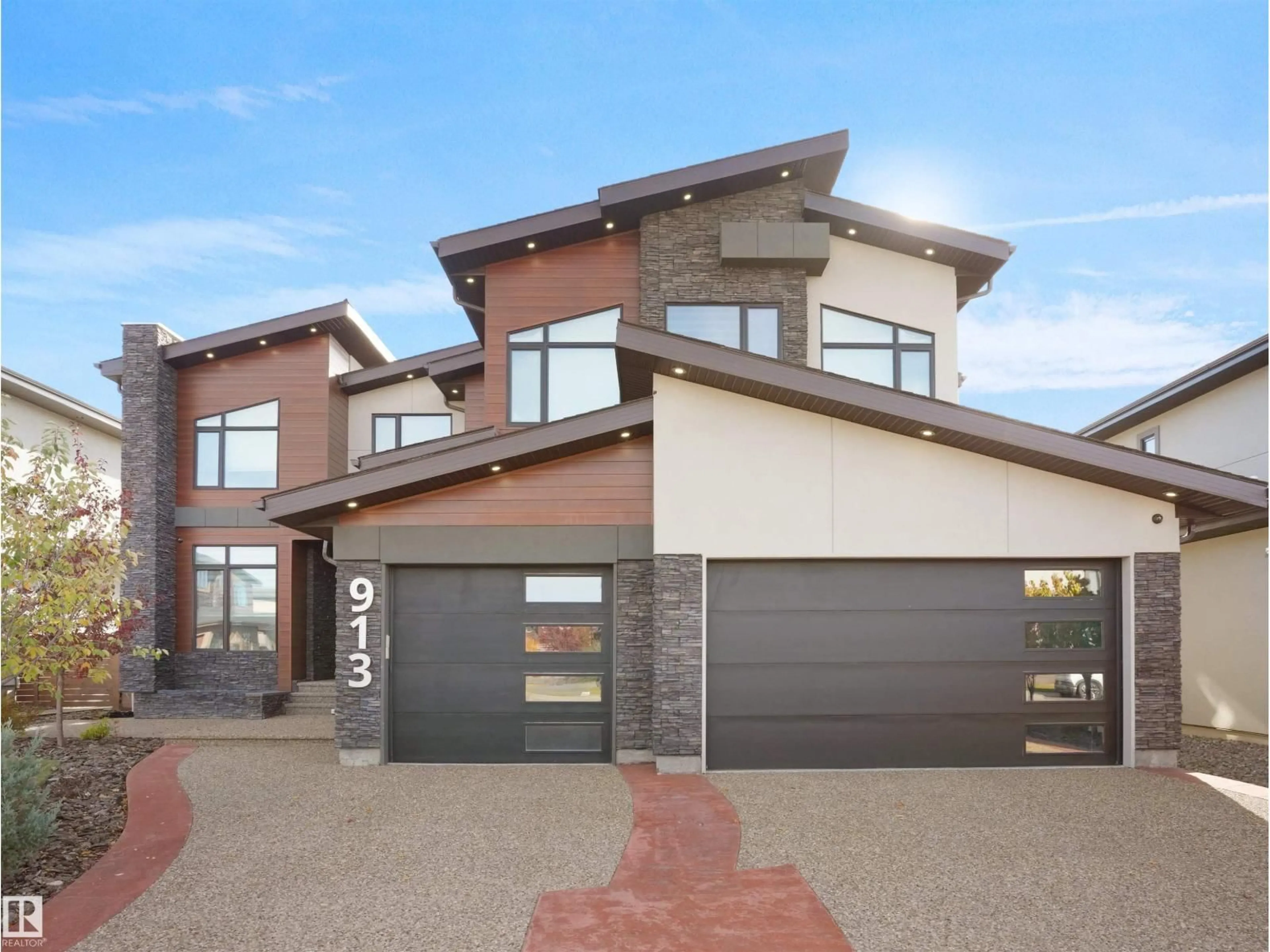 Home with brick exterior material, street for 913 WOOD PL, Edmonton Alberta T6W3G8