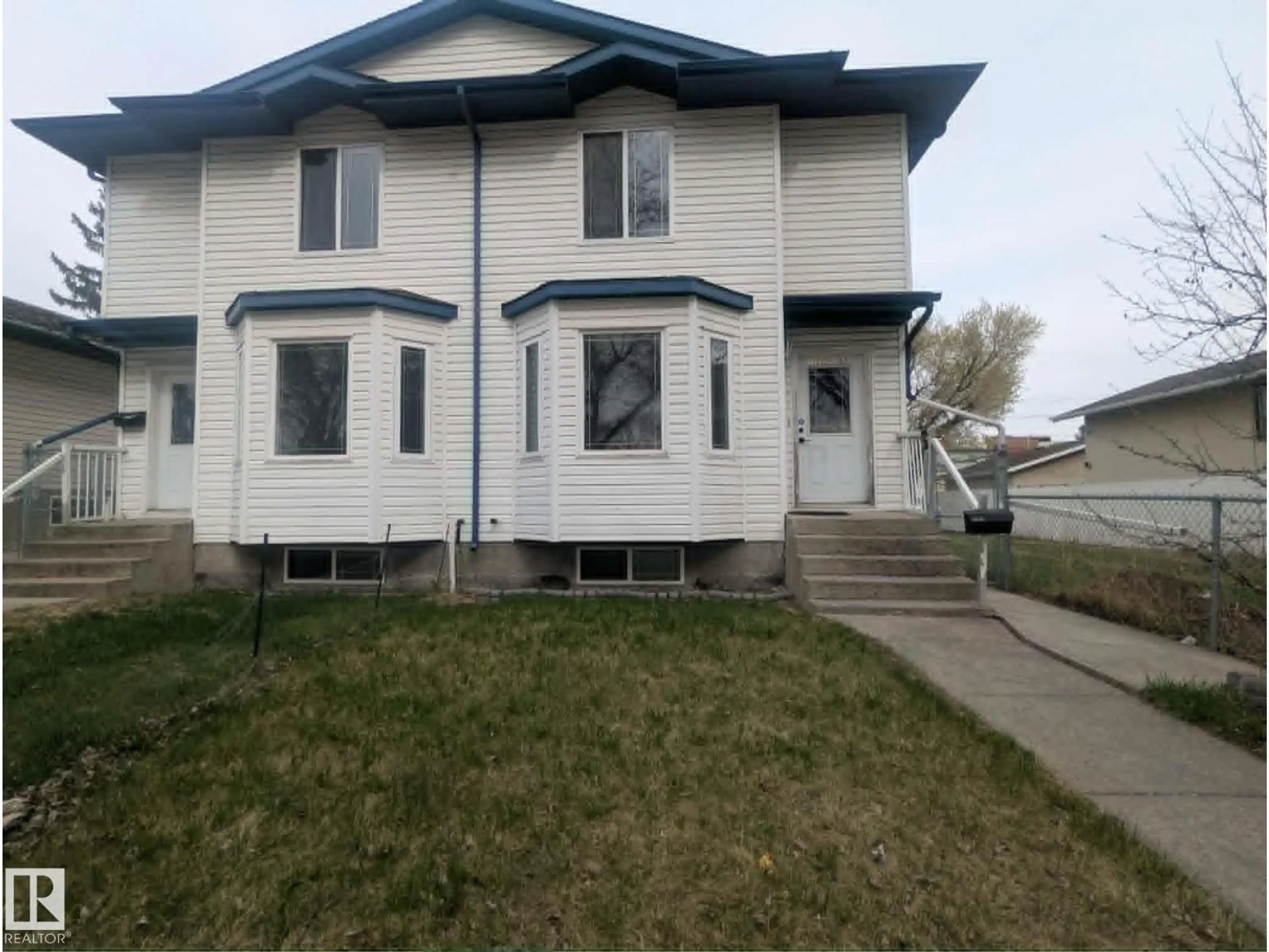 Home with vinyl exterior material, street for 11725 83 ST, Edmonton Alberta T5B2Z1