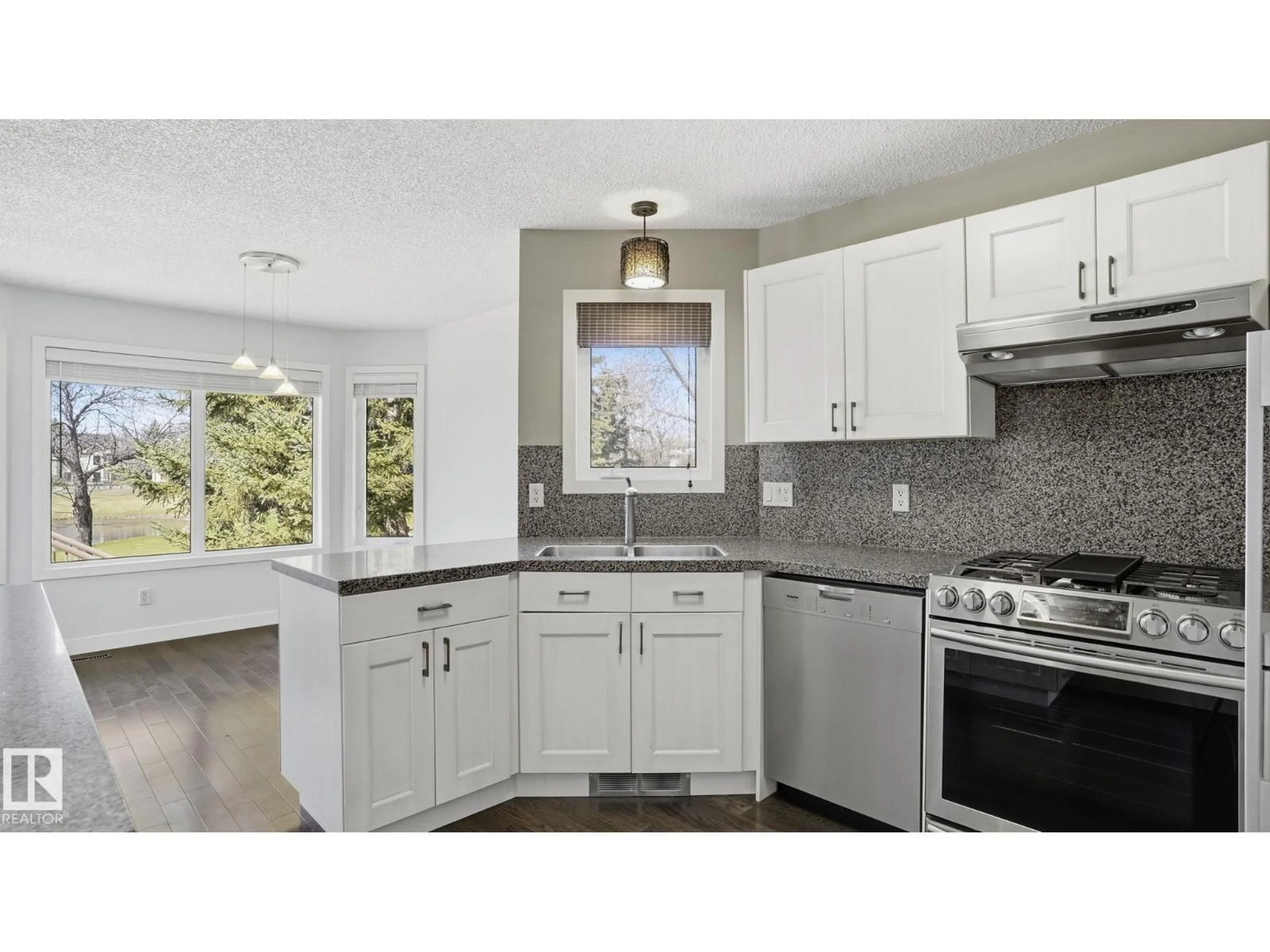 Open concept kitchen, ceramic/tile floor for 1346 POTTER GREENS DR, Edmonton Alberta T5T6A3