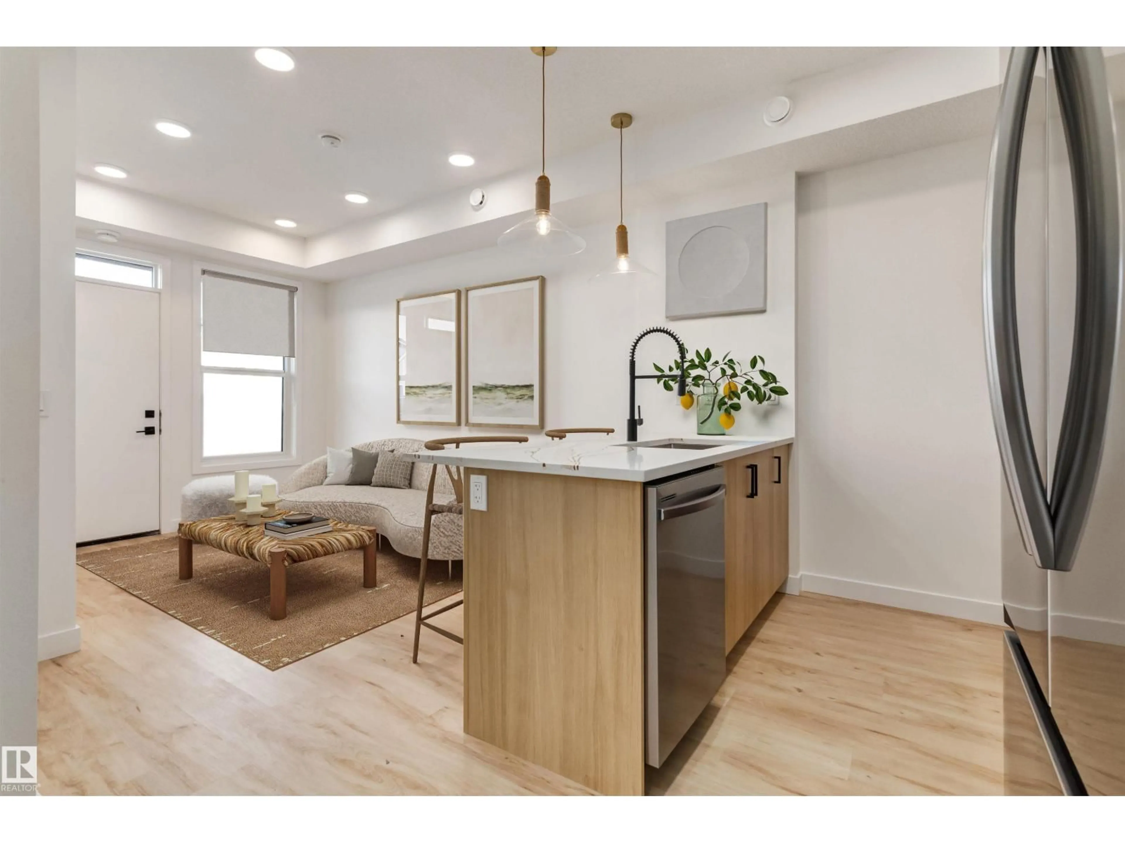 Open concept kitchen, wood/laminate floor for #24 - 16231 19 AV, Edmonton Alberta T6W5C6