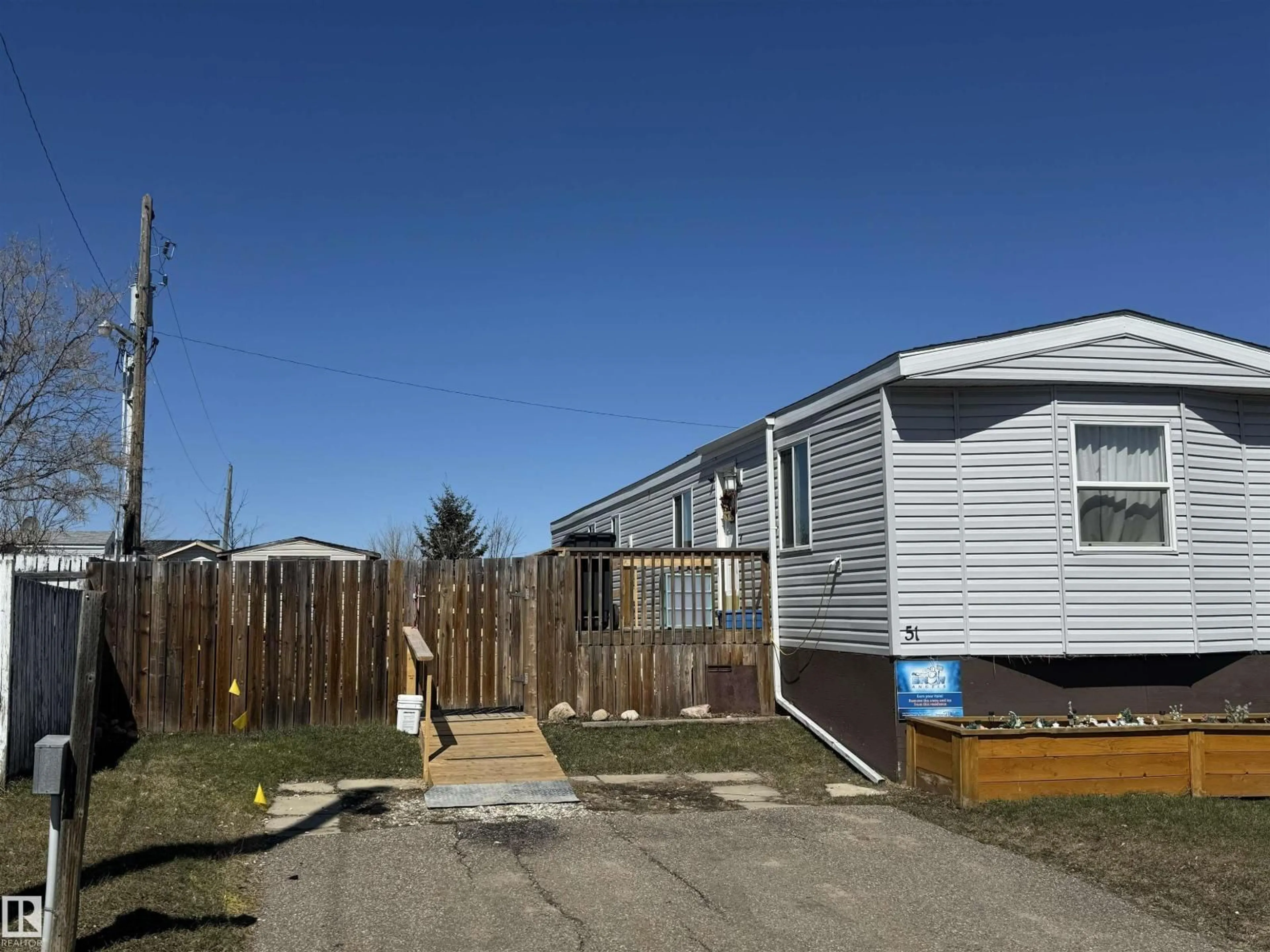 A pic from outside/outdoor area/front of a property/back of a property/a pic from drone, street for 51 WILDWOOD, Cold Lake Alberta T9M1Z4