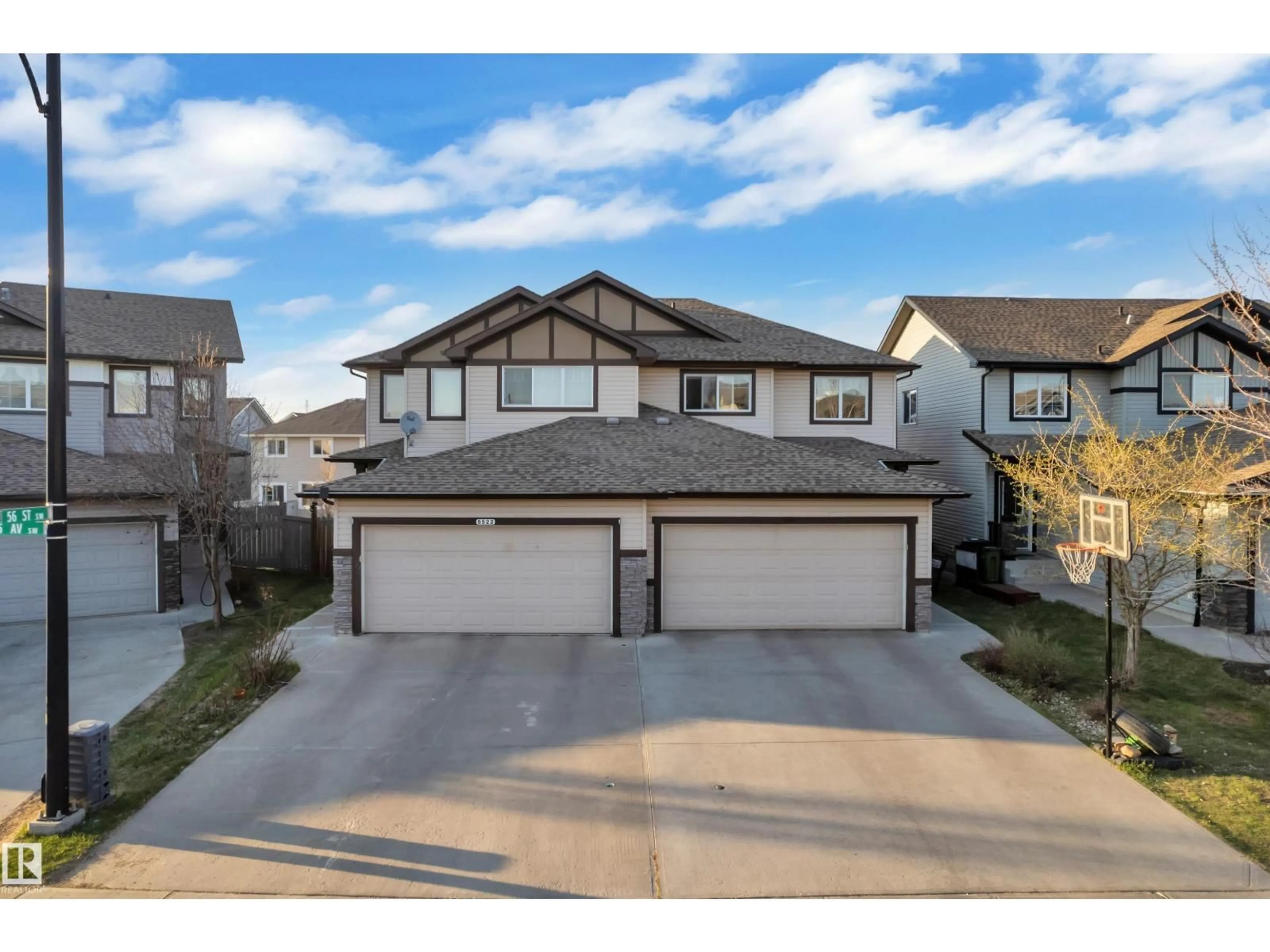 A pic from outside/outdoor area/front of a property/back of a property/a pic from drone, street for 5520 5 AV, Edmonton Alberta T6X1R9