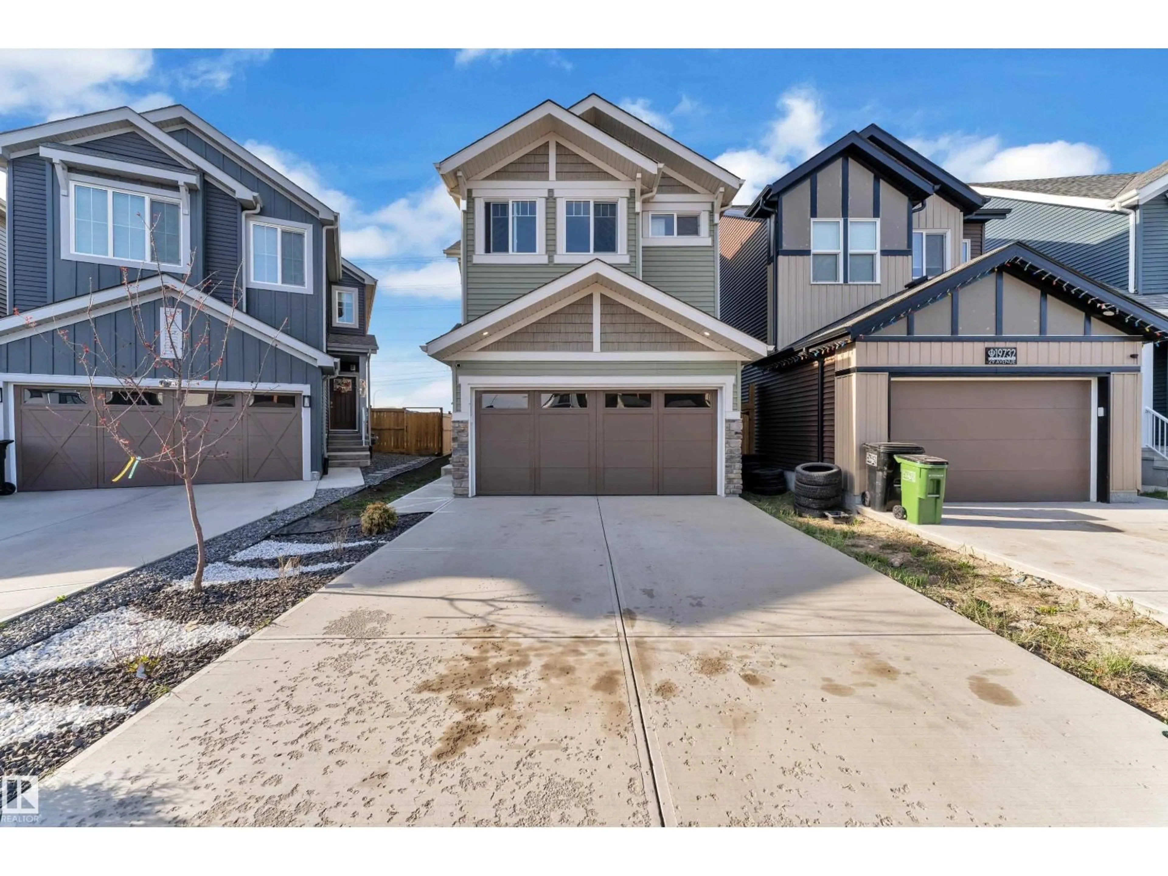 Home with vinyl exterior material, street for NW - 19734 29 AV, Edmonton Alberta T6M1M2