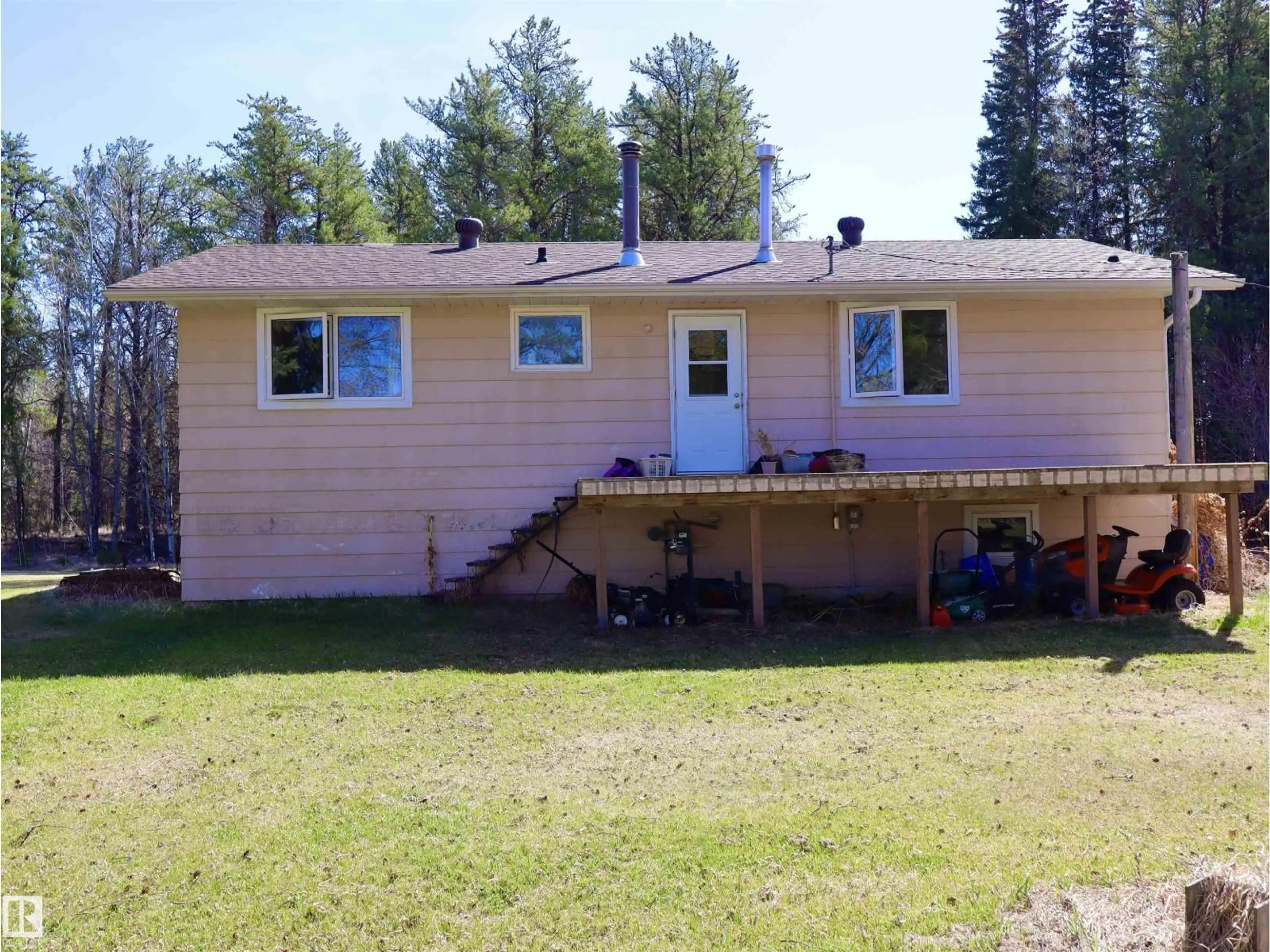 A pic from outside/outdoor area/front of a property/back of a property/a pic from drone, unknown for 633004 RANGE ROAD 50A, Rural Woodlands County Alberta T0G1A0