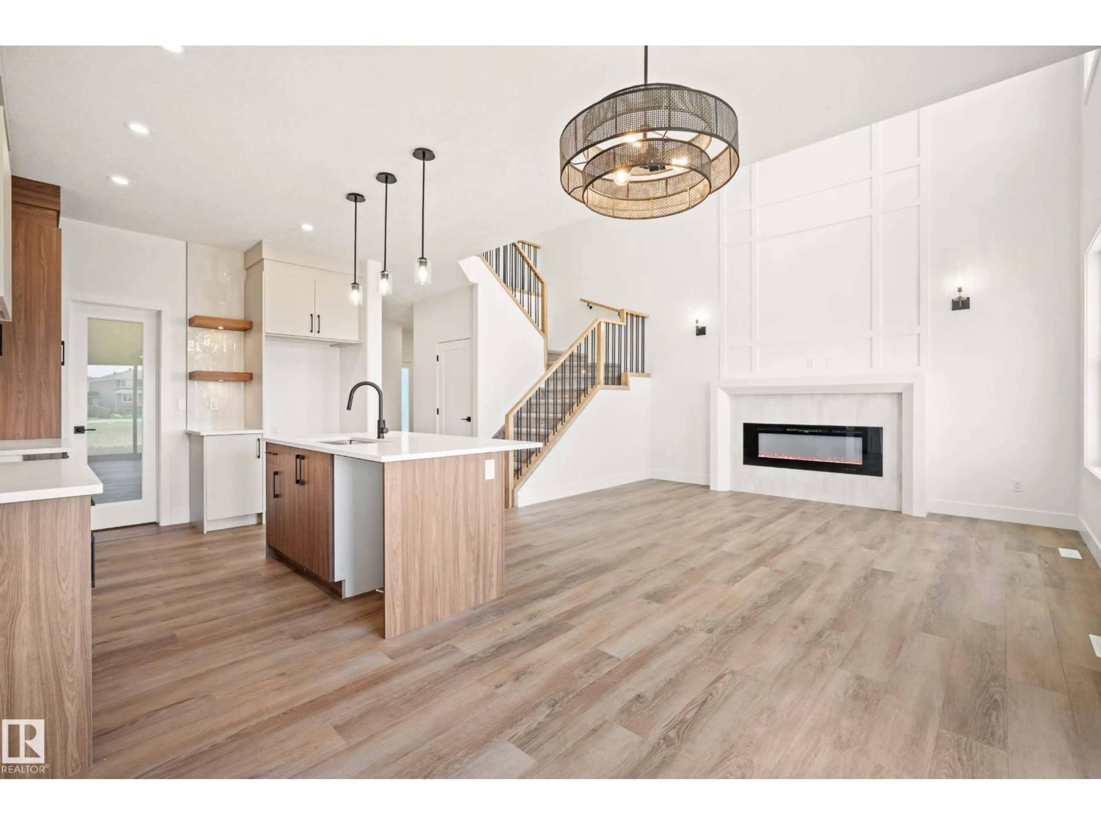 Open concept kitchen, wood/laminate floor for 118 CALEDON CR, Spruce Grove Alberta T7X0Y8